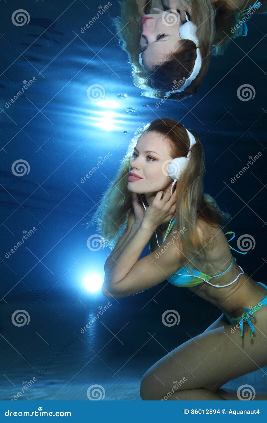 Swimmer wearing headphone stock photo. Image of diver 86012894