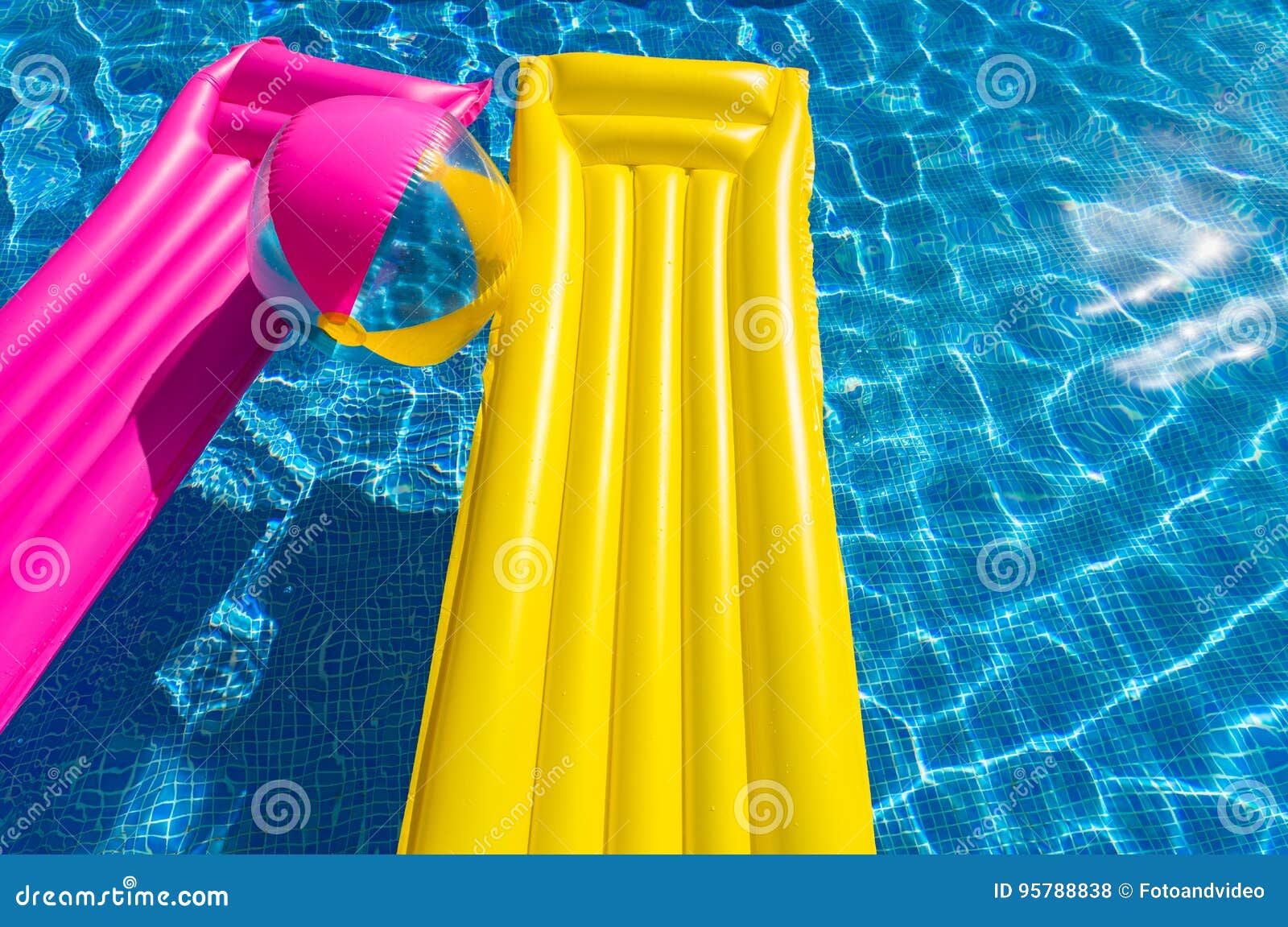 Swimming Pool with Air Mattress and Beachball Stock Photo - Image of ...