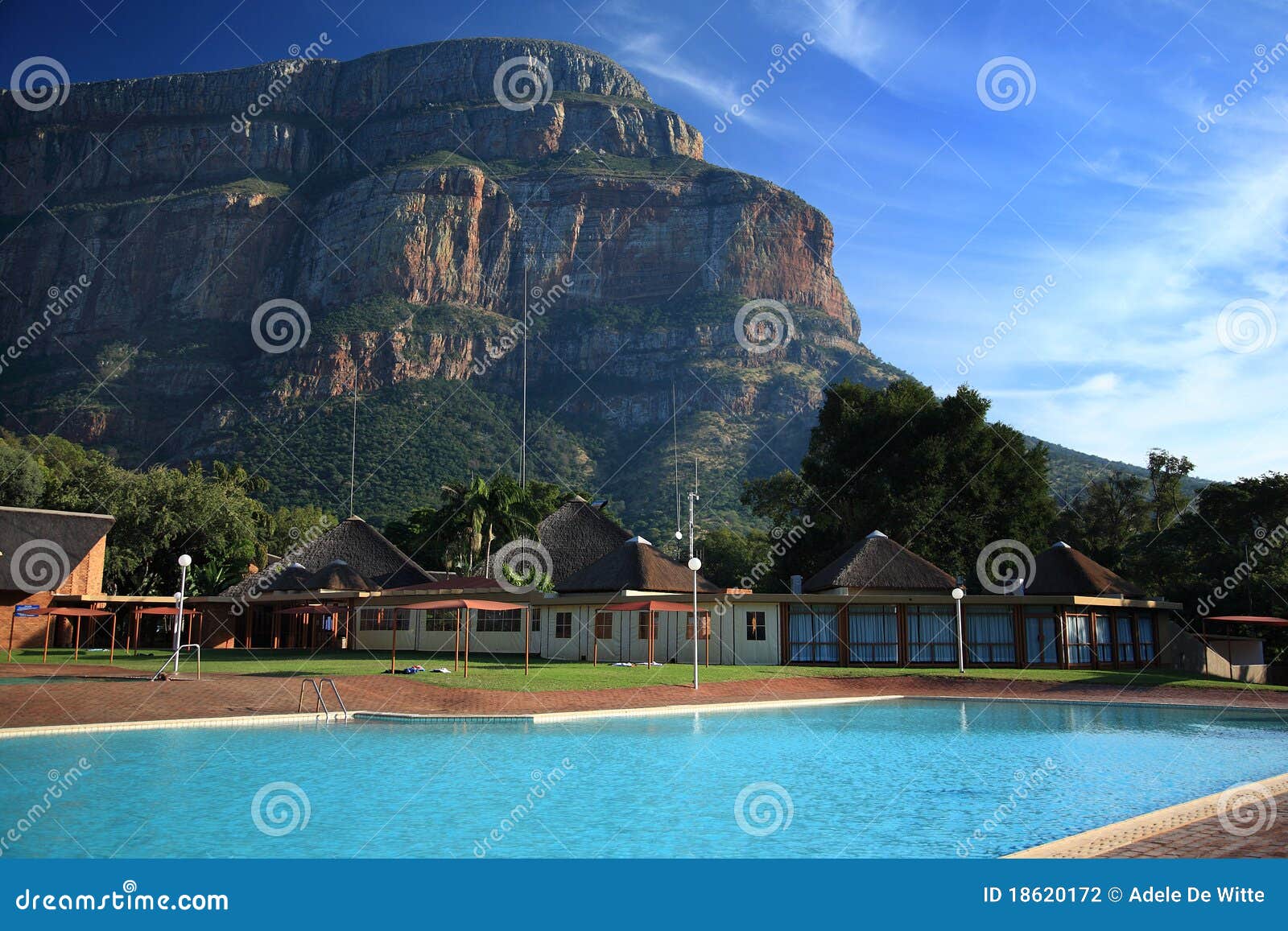 Swimming Pool Area At Holiday Resort In Swadini Stock Photo - Image of sunny, grass ...1300 x 957