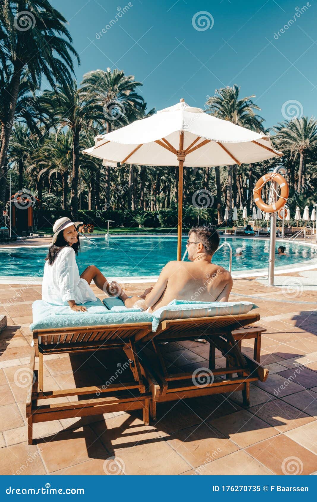 Swimming Pool With Bed Chairs Luxury Resort Couple Men