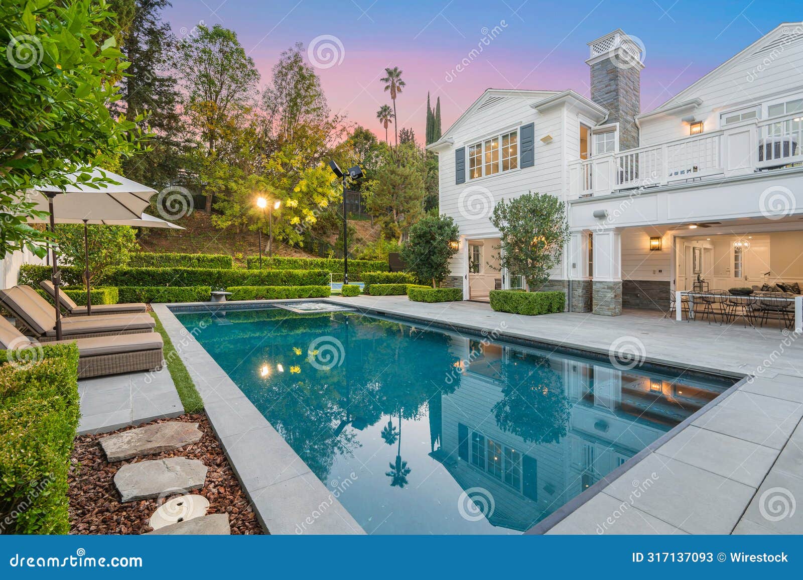 swimming pool in front of a new construction home in encino, california