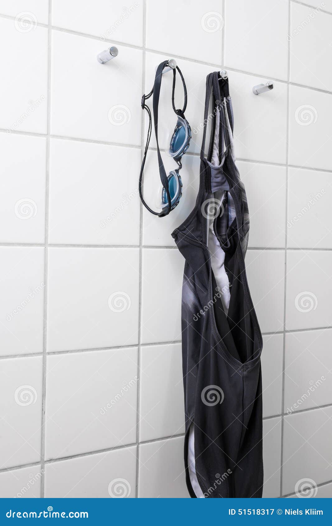 Swimsuit and Swim Goggles on Hooks Stock Image - Image of hygiene