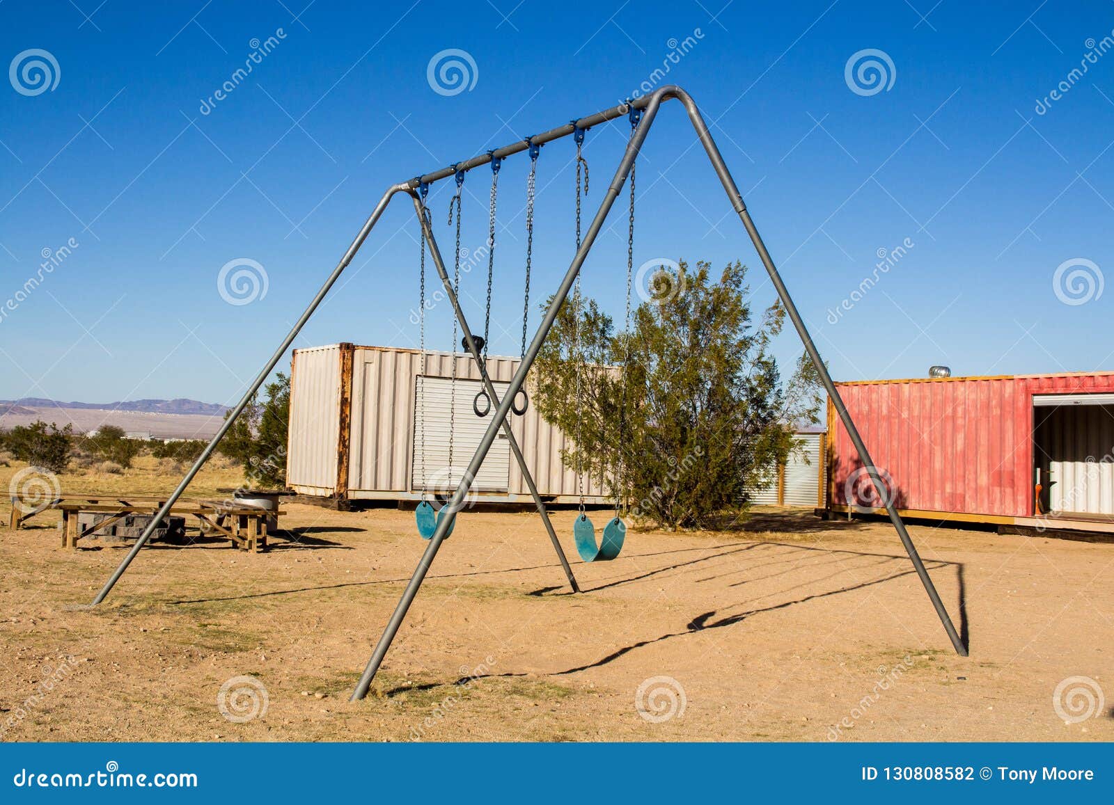 Swing set in the Desert stock photo. Image of desertn 130808582