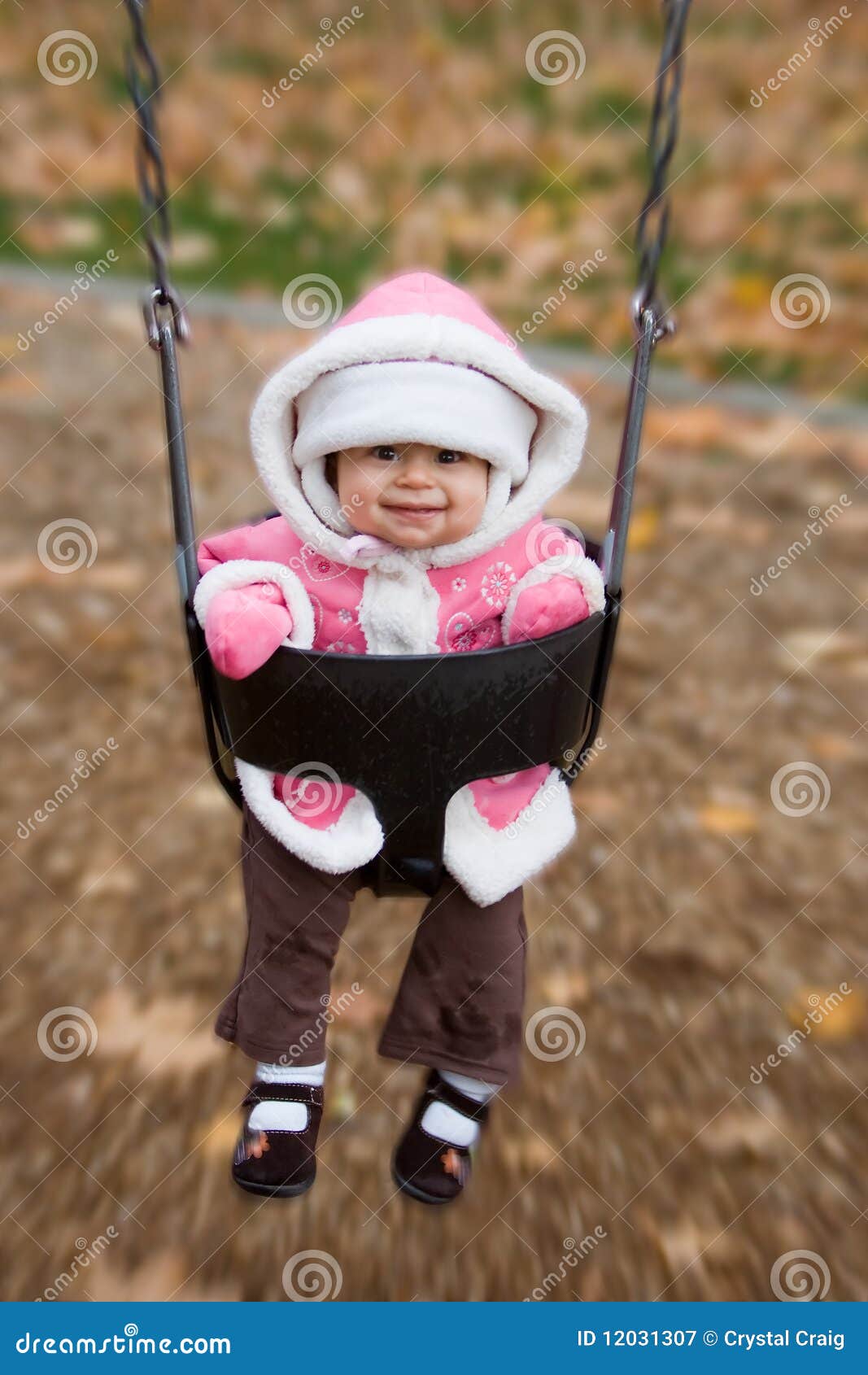 Swinging baby playground stock image. Image of playground 12031307