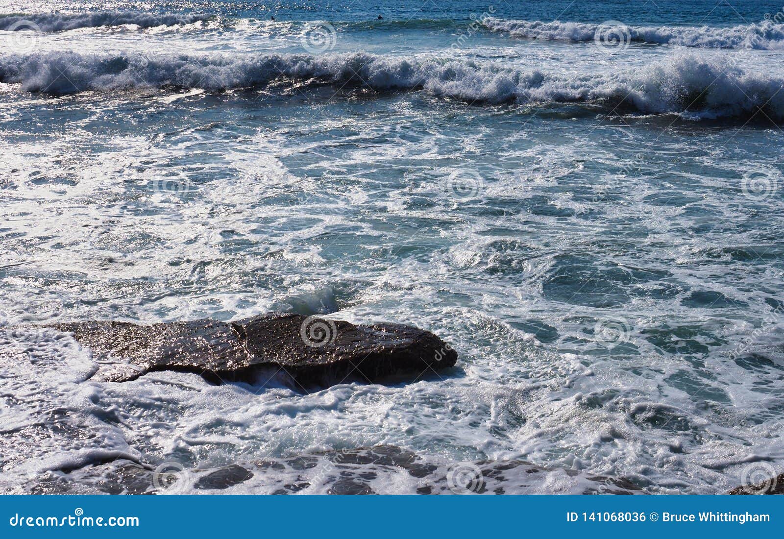 swirling pacific ocean waves breaking over rocks, sydney, australia