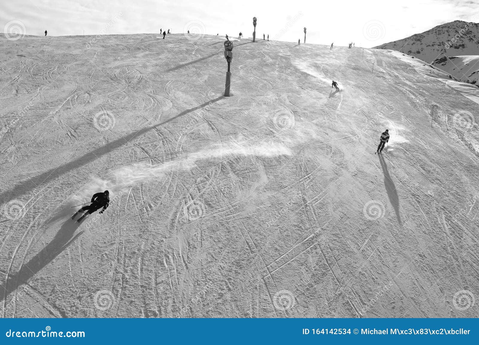 swiss alps: skiing on artificial snow due to the global climate change at parsenn above davos city