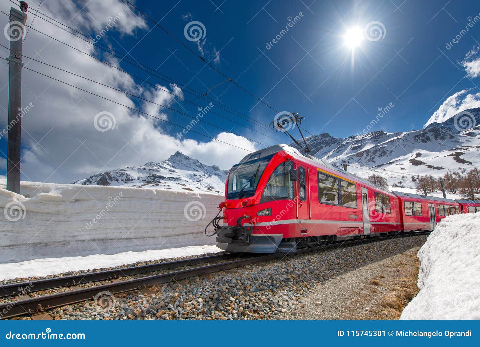 swiss mountain train bernina express crossed alps with snow wall