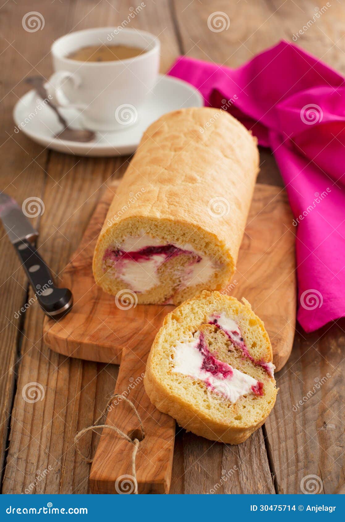 Swiss Roll with Whipped Cream and Black Currant Jam Stock Photo Image
