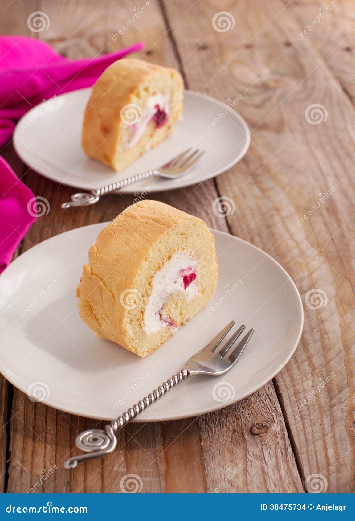 Swiss Roll with Whipped Cream and Black Currant Jam Stock Photo Image