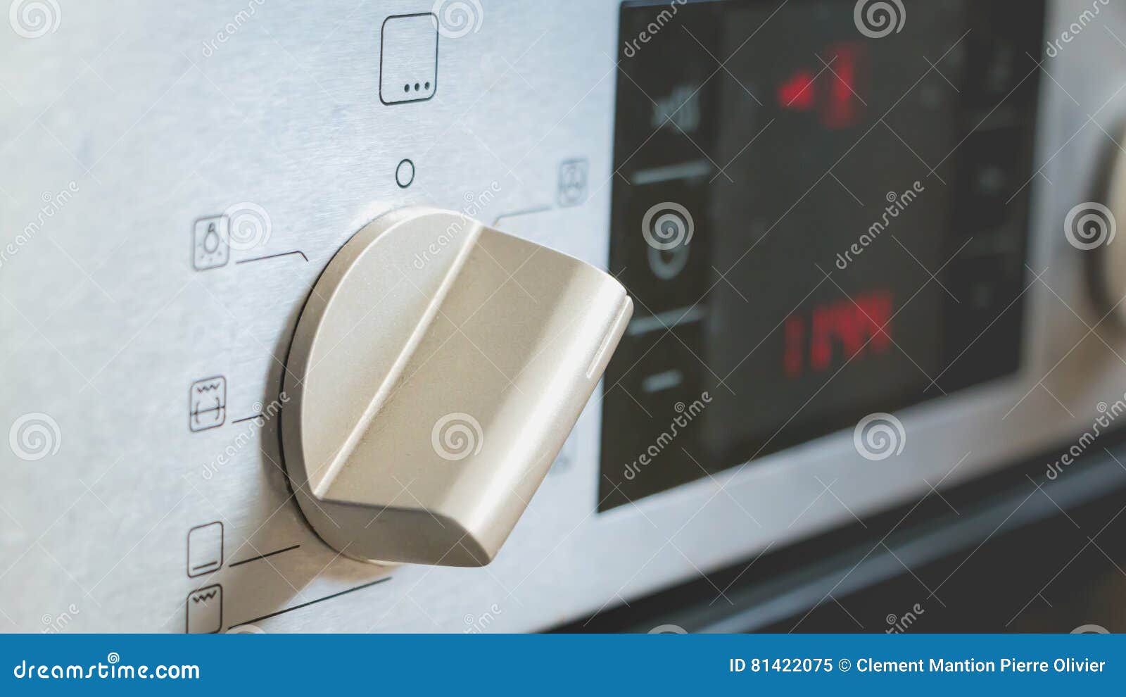 Switch on an electric oven stock image. Image of position 81422075