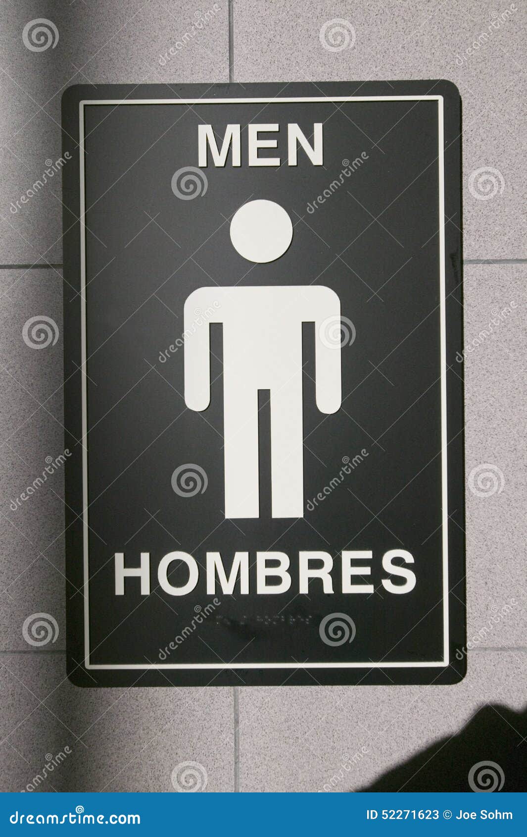  for man, hombres, in front of airport bathroom