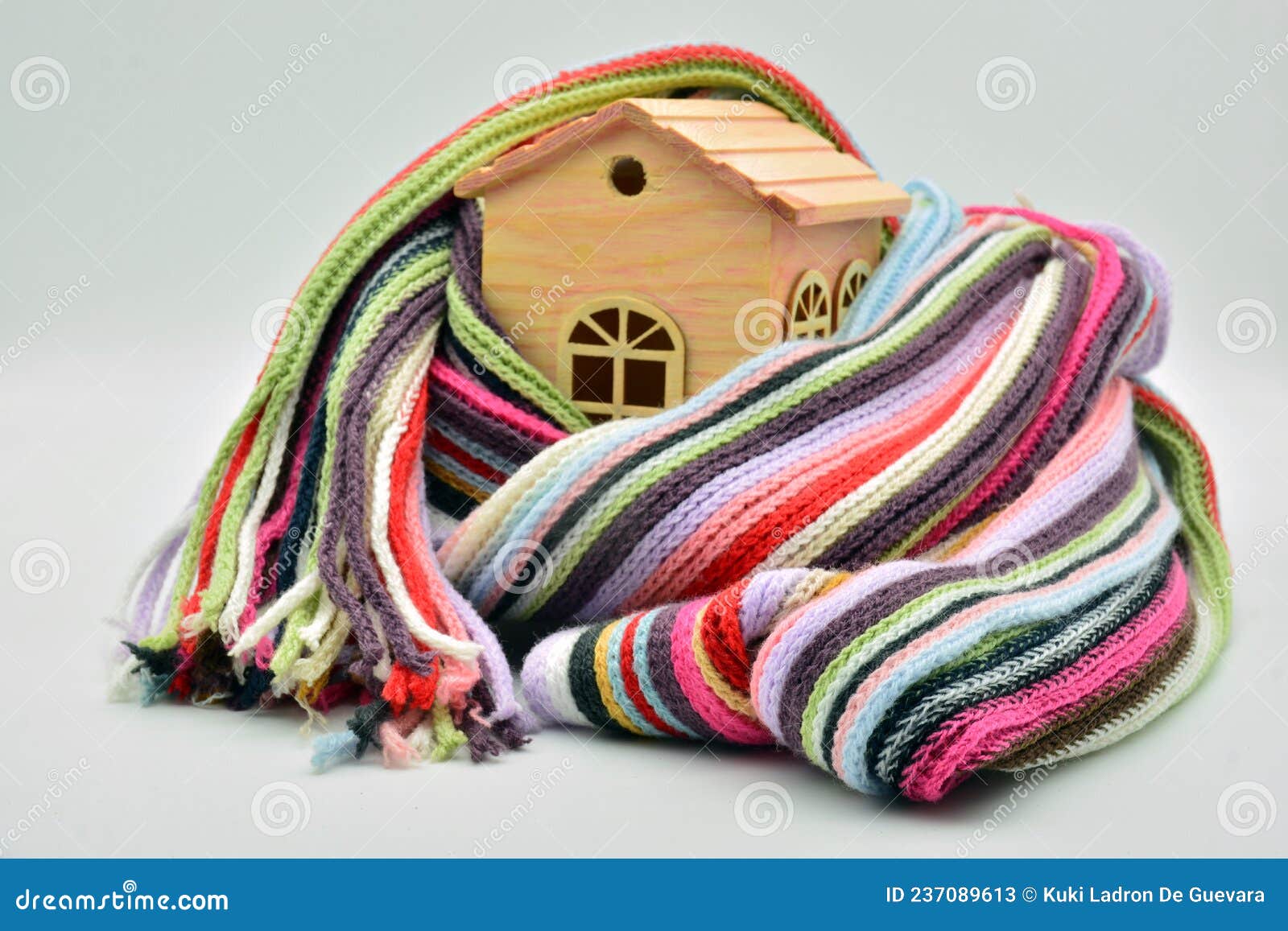 wooden house sheltered with a scarf
