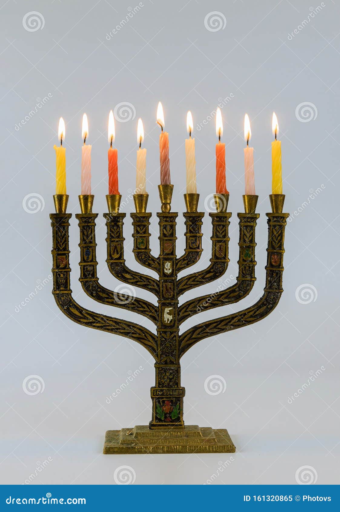 a ic candle lighting for the jewish holiday of hanukkah menorah with lit candles in celebration of chanukah