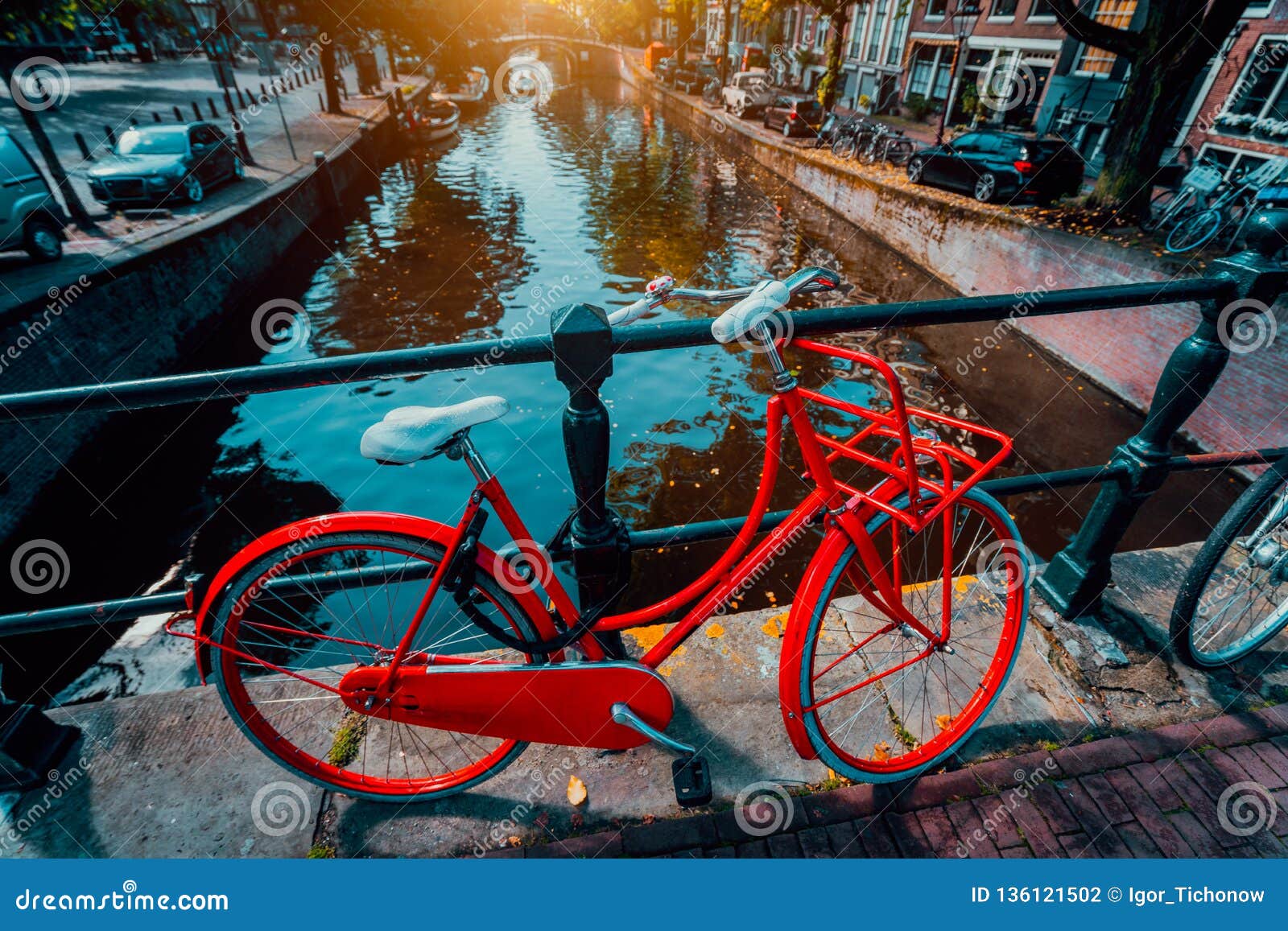 Symbols of Amsterdam: Red Bicycle Parked on a Bridge, Netherlands ...