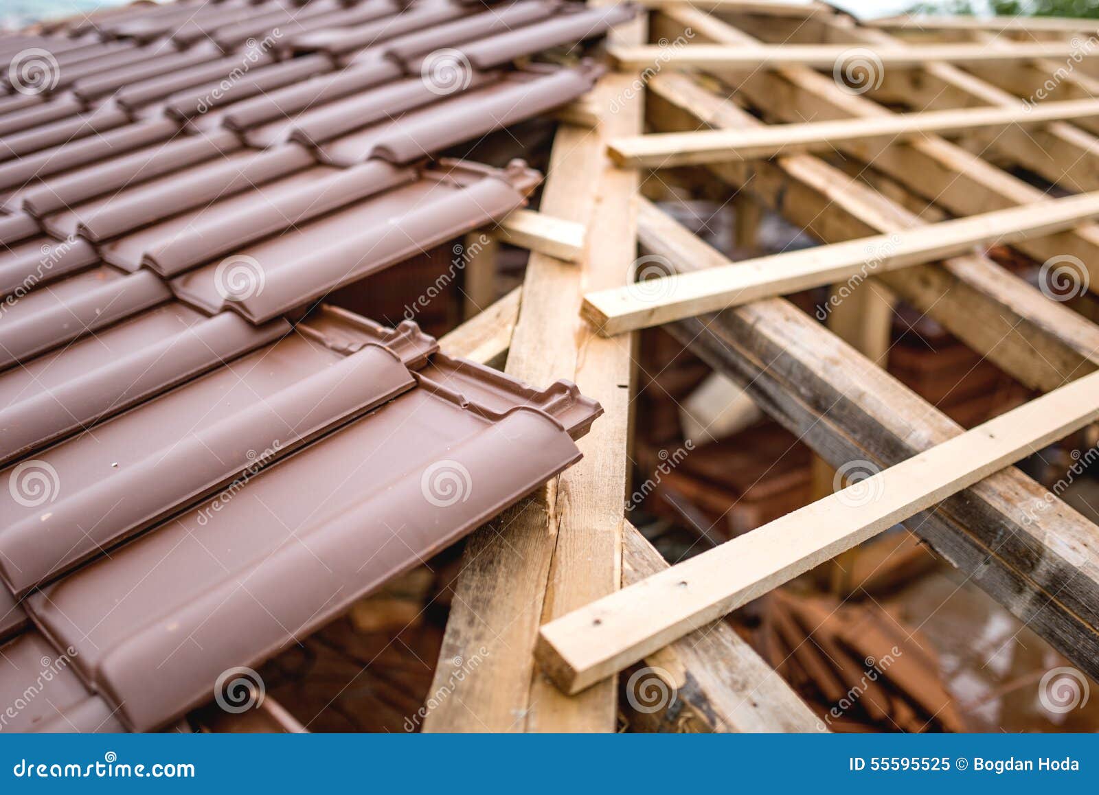 symmetric distribution of roof tiles on new house construction site