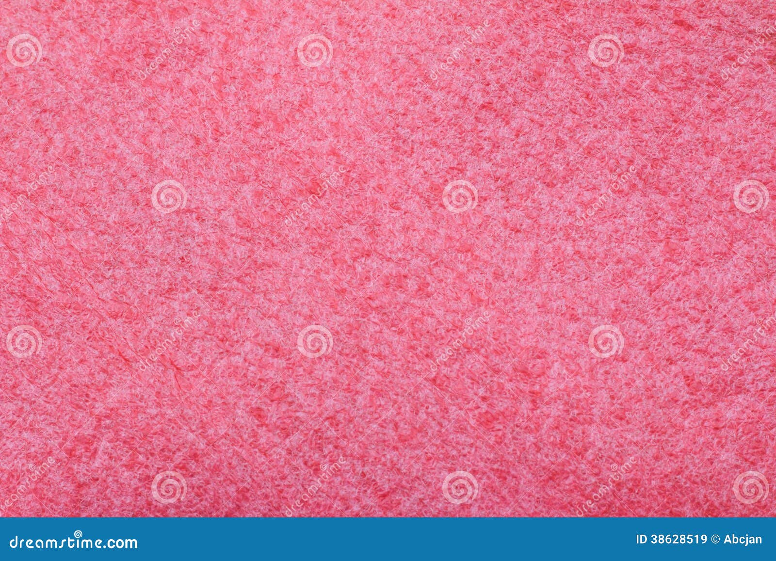 Texture of a porous pink sponge in close-up as an abstract