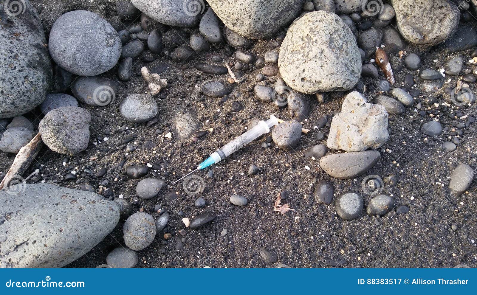 Syringe on Beach stock image. Image of syringe, used 88383517