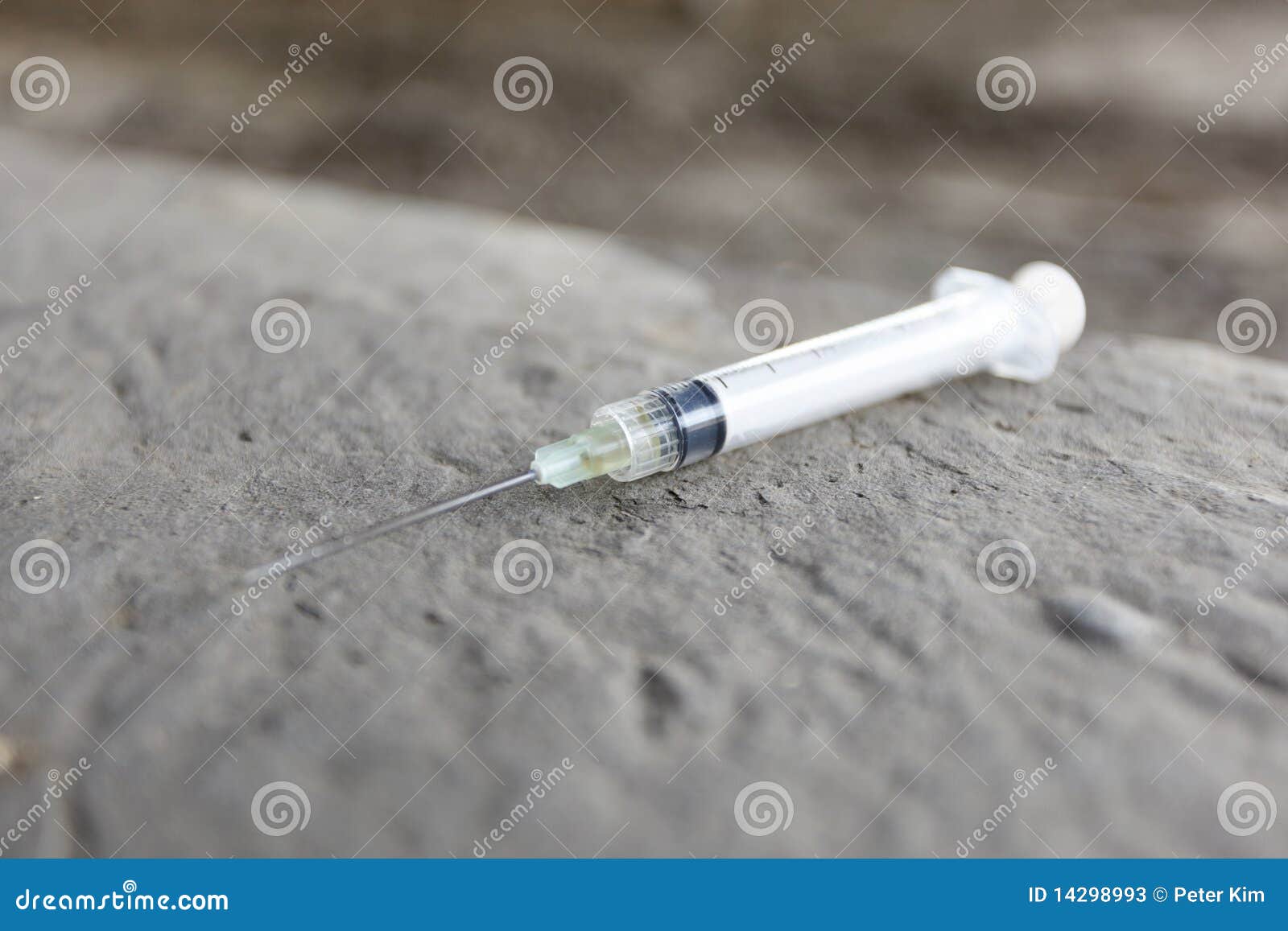 Syringe on the ground stock image. Image of syringe, needle 14298993