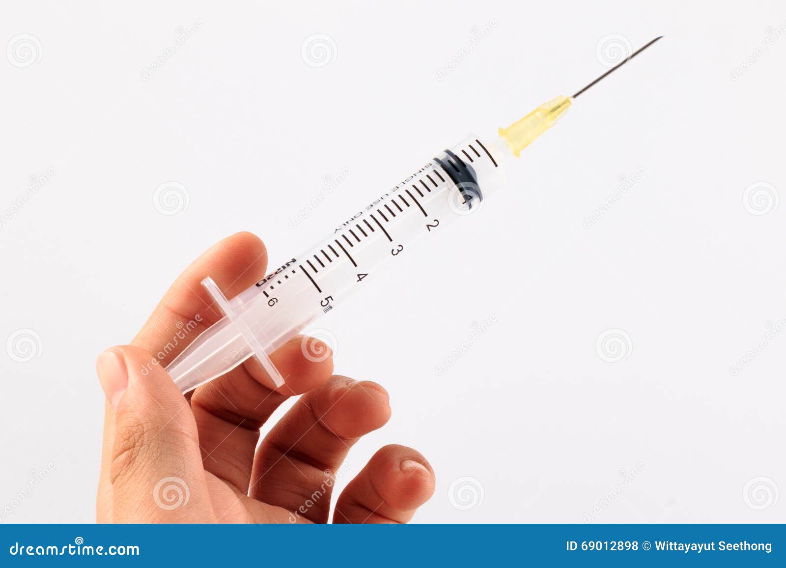 Syringe in a Hand of a Man. Stock Photo Image of medicine, injection