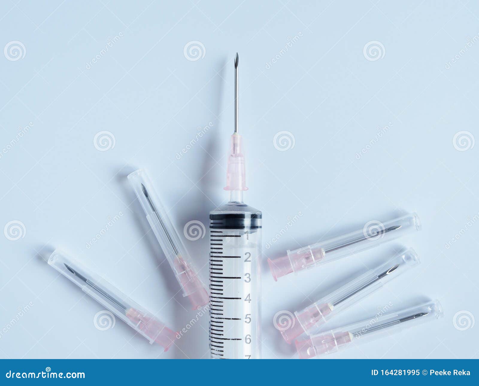 Syringe Needle Hypodermic Injection of Sick Dog on Clean Background