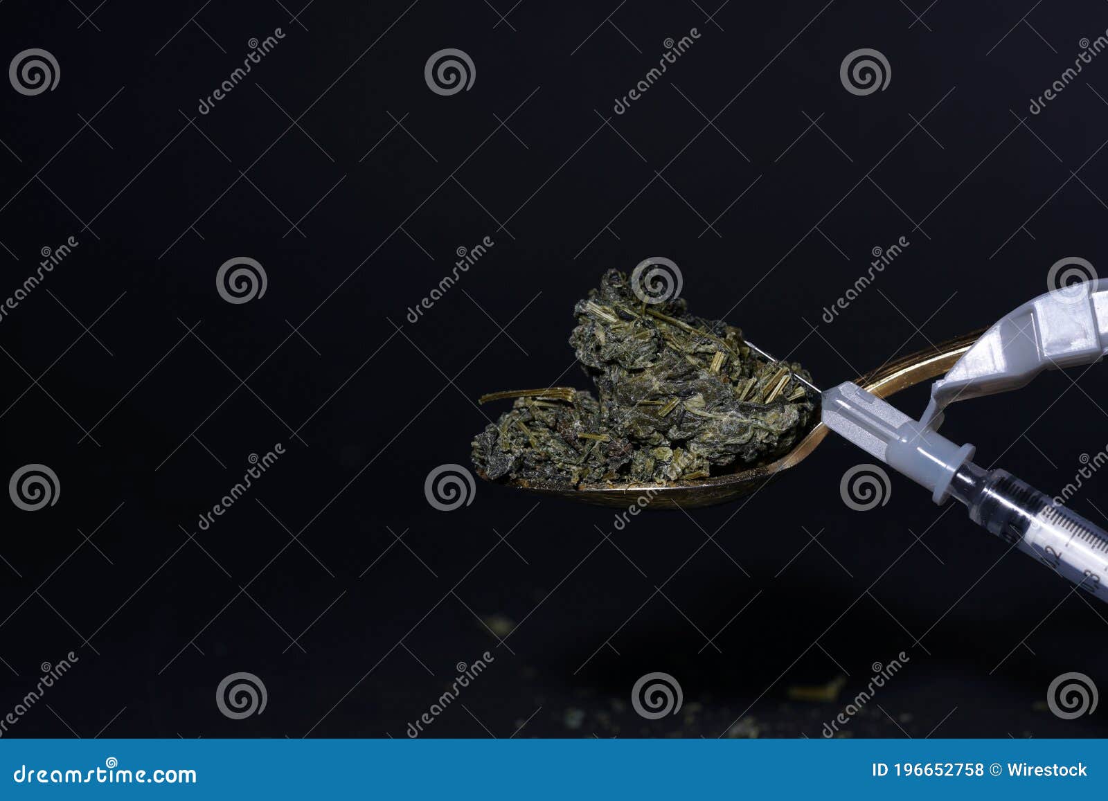 Syringe on Tea Leaves on a Teaspoon Stock Photo Image of drinking