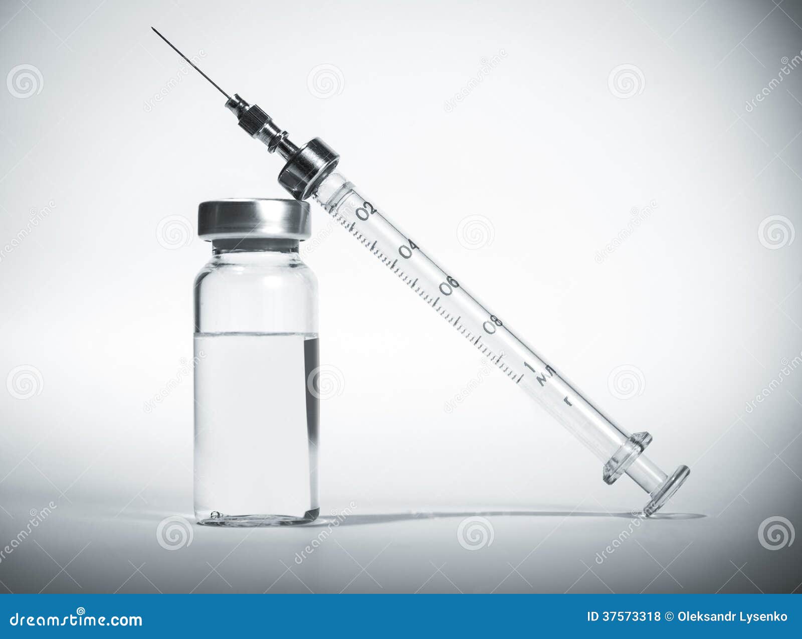 syringe with vial of medication closeup