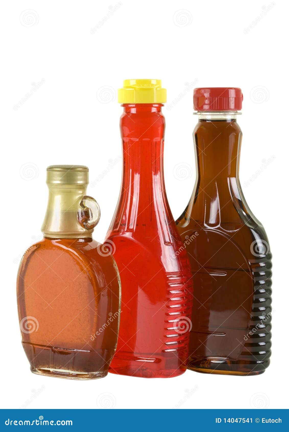 Syrup in Three Bottles stock image. Image of pure, strawberry 14047541