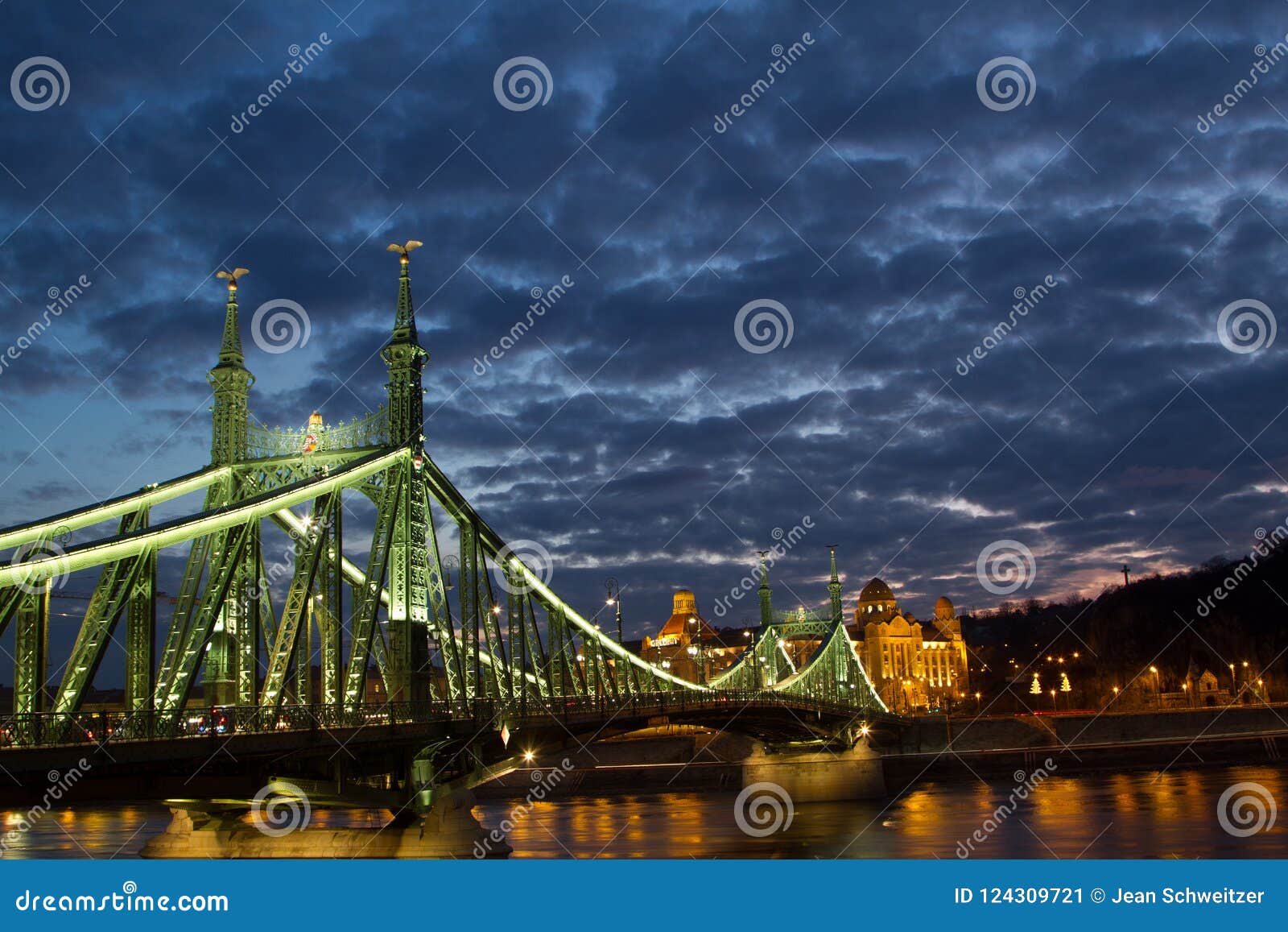liberty bridge in budapest hungary at night with a nice cloudy s