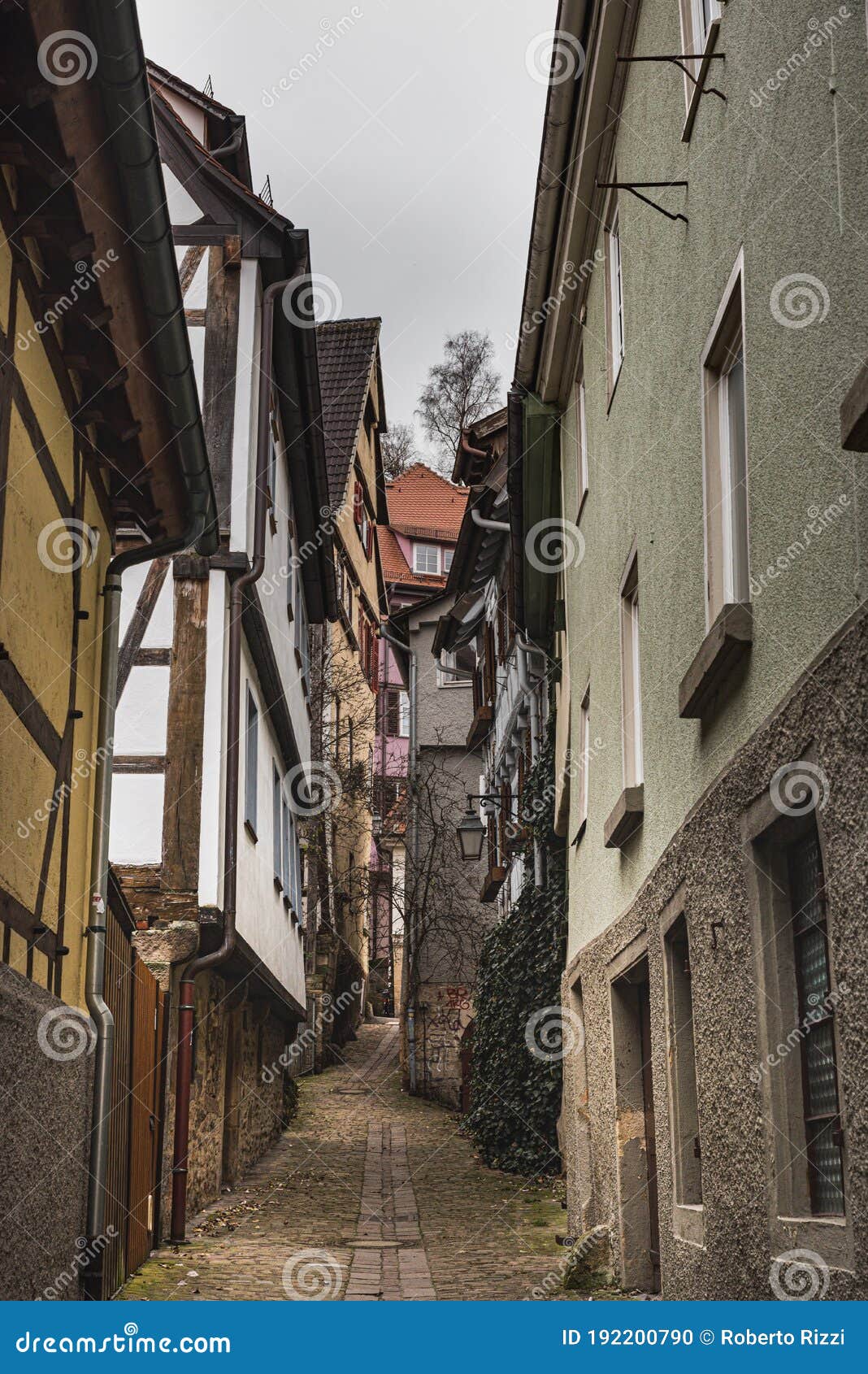 Medieval Architecture And Travel Typical German Half Timbered Buildings On A Narrow Cobbled Alley Or Alleyway Munzgasse Stock Photo Image Of Travel Narrow Medieval Architecture And Travel Typical German Half Timbered Buildings On A Narrow Cobbled Alley Or Alleyway Munzgasse Stock Photo Image Of Travel Narrow