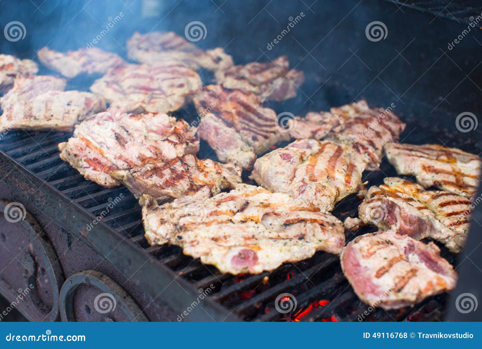 T-bone Steak Cooking On An Open Flame Grill Stock Photo ...