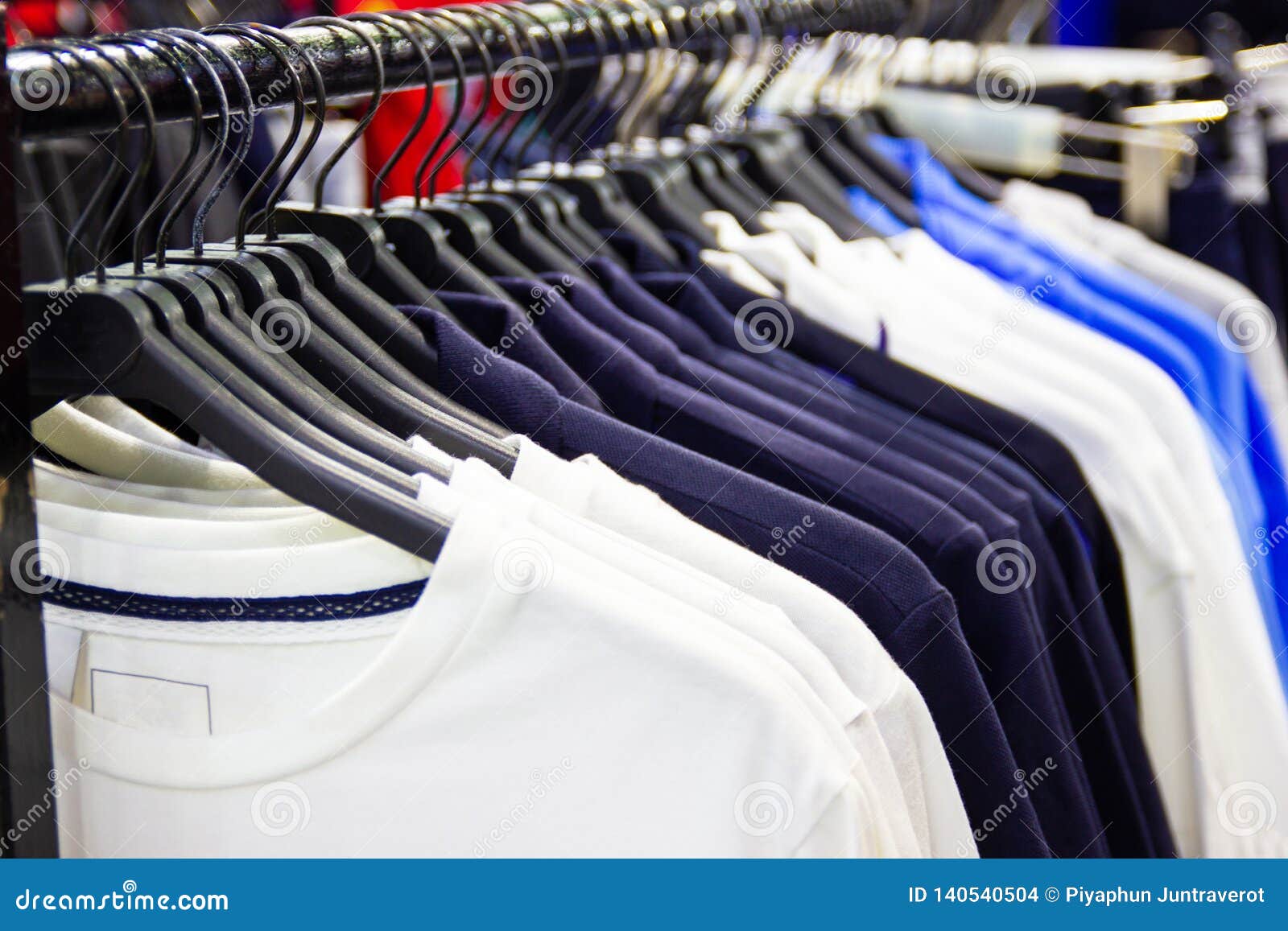 T-shirt on Hangers for Sale in Department Stores. Stock Photo - Image ...