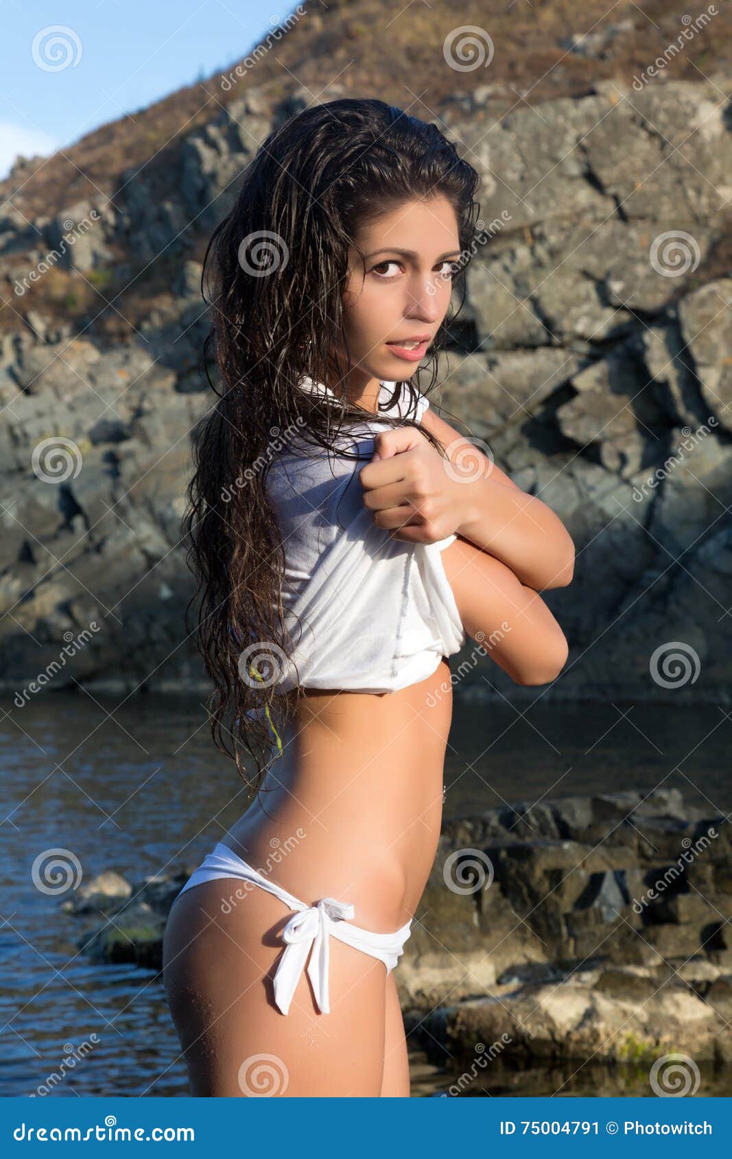 Portrait Young Woman Taking Her Shirt Off Stock Photos - Free