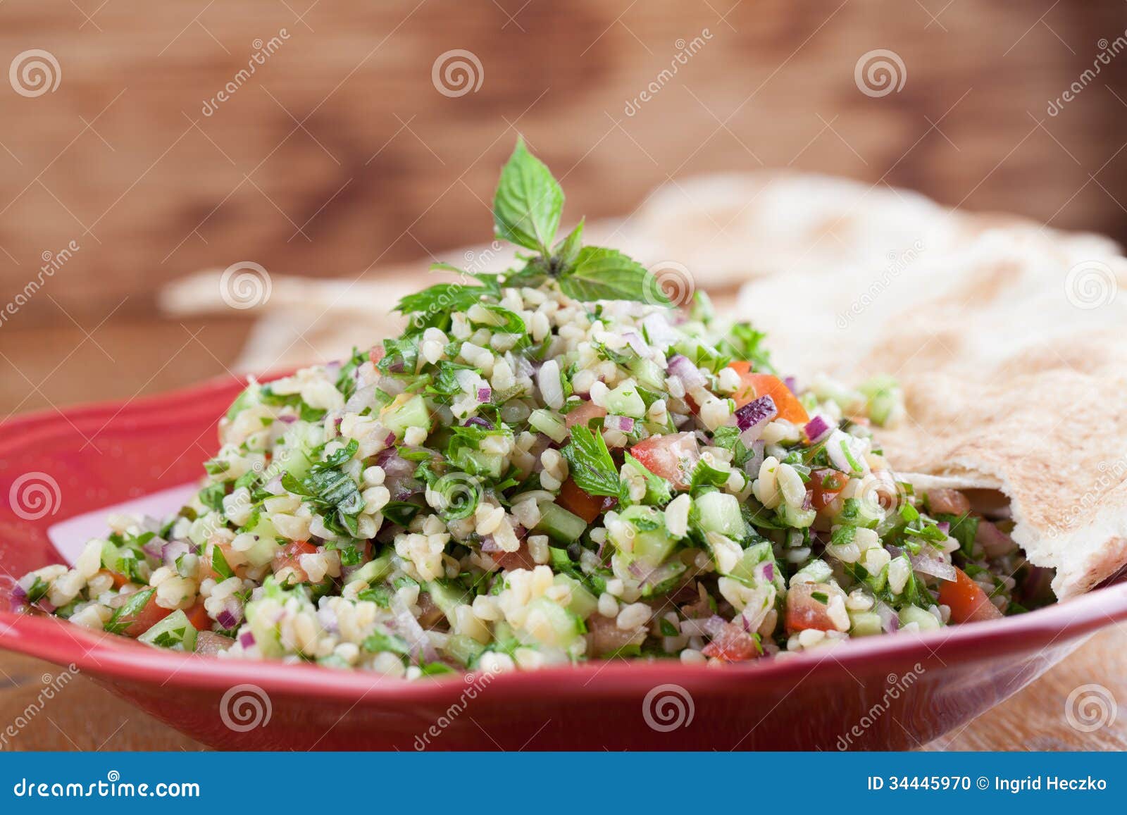 Tabbouleh with pita bread stock photo. Image of fruit 34445970