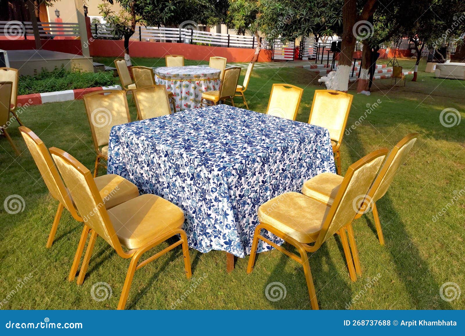 Table and Chair Arrangement in Open Space for Wedding Event Stock Photo