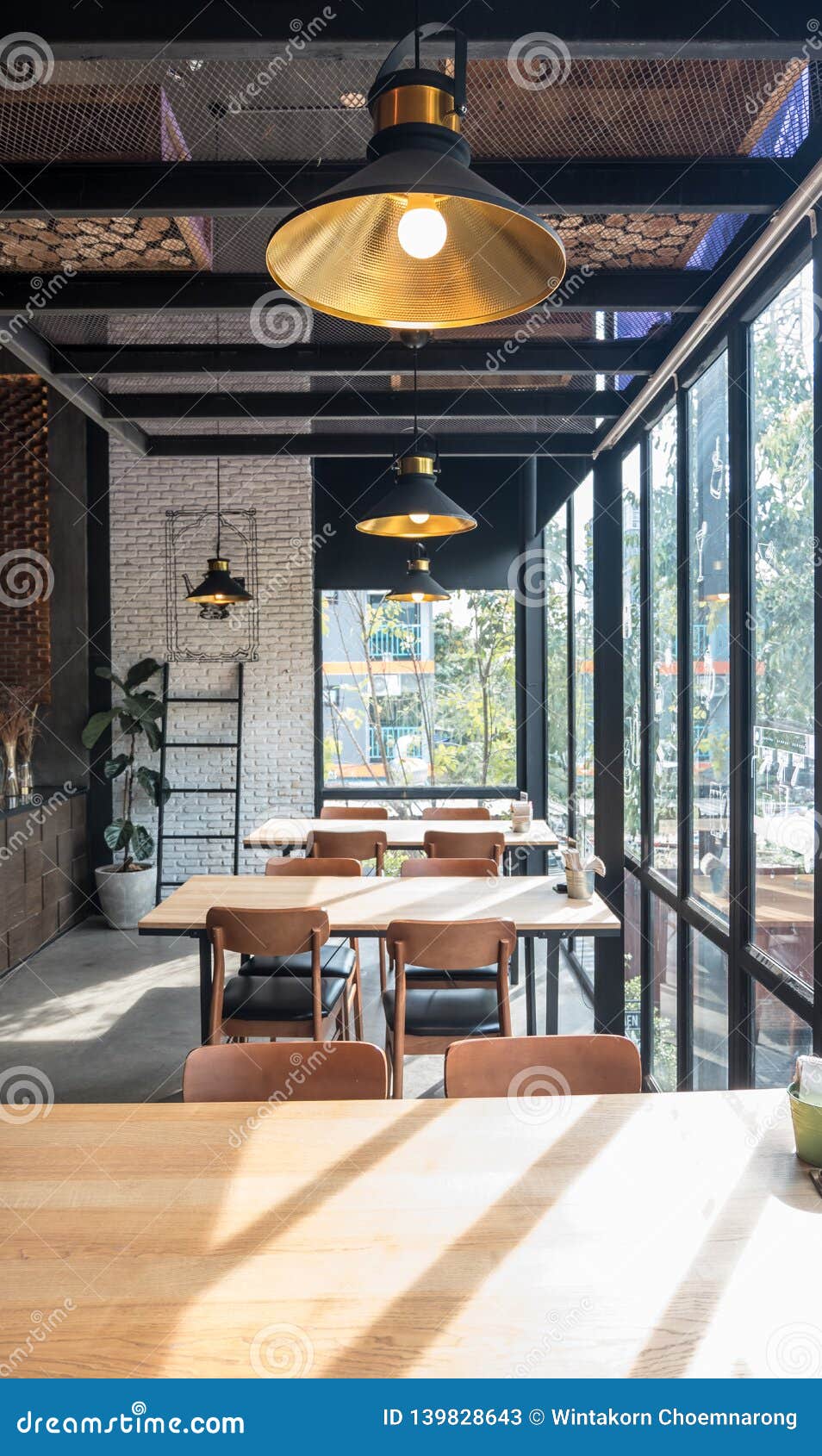 Table And Chair Set In Modern Cafe Minimalistic Interior Design