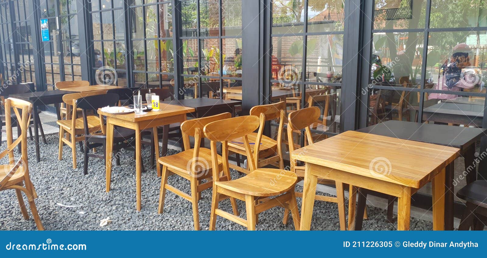 A Table and Chairs in a Coffee Shop Made of Wood Stock Image Image of meal, design 211226305