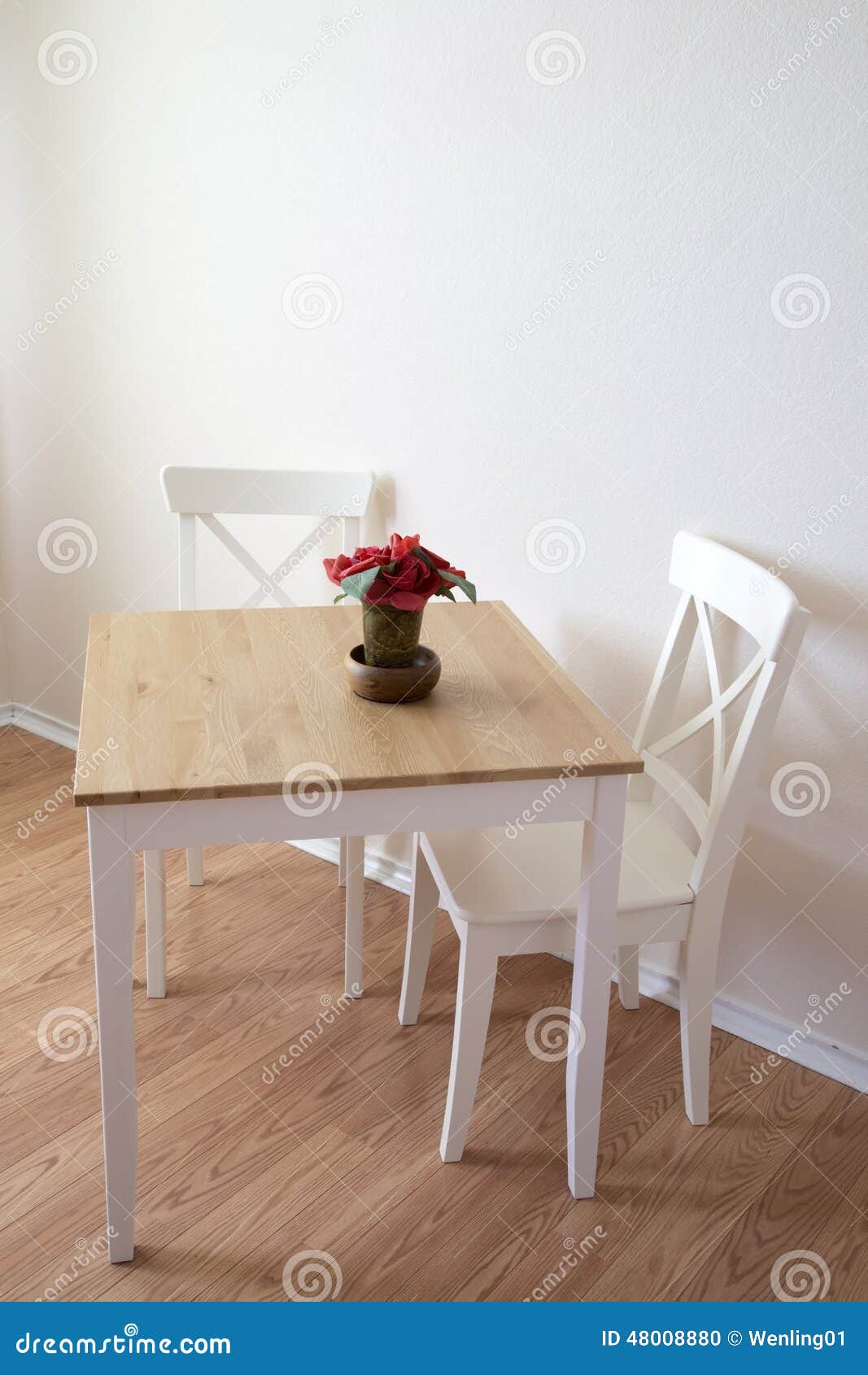 Table and chairs in dinning room. Nice wooden dinning room table and chairs background.