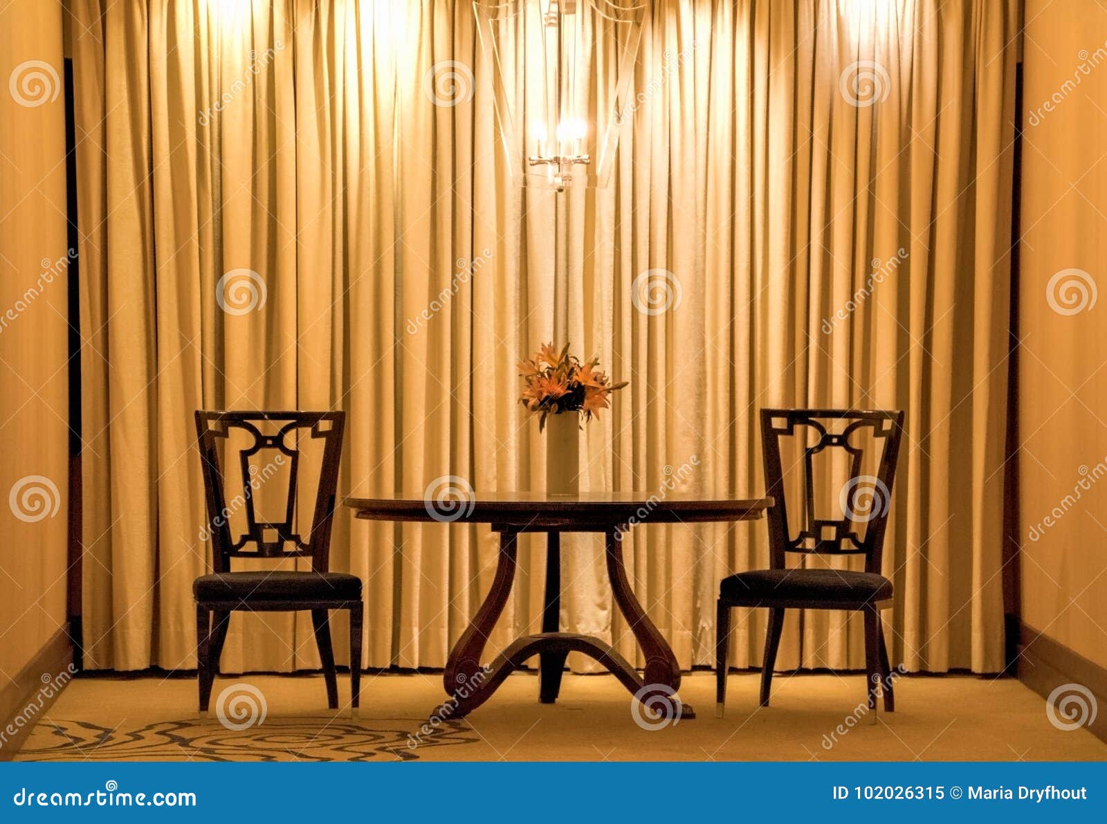 Table and Chairs in Gold Room Stock Image - Image of lamp, light: 102026315