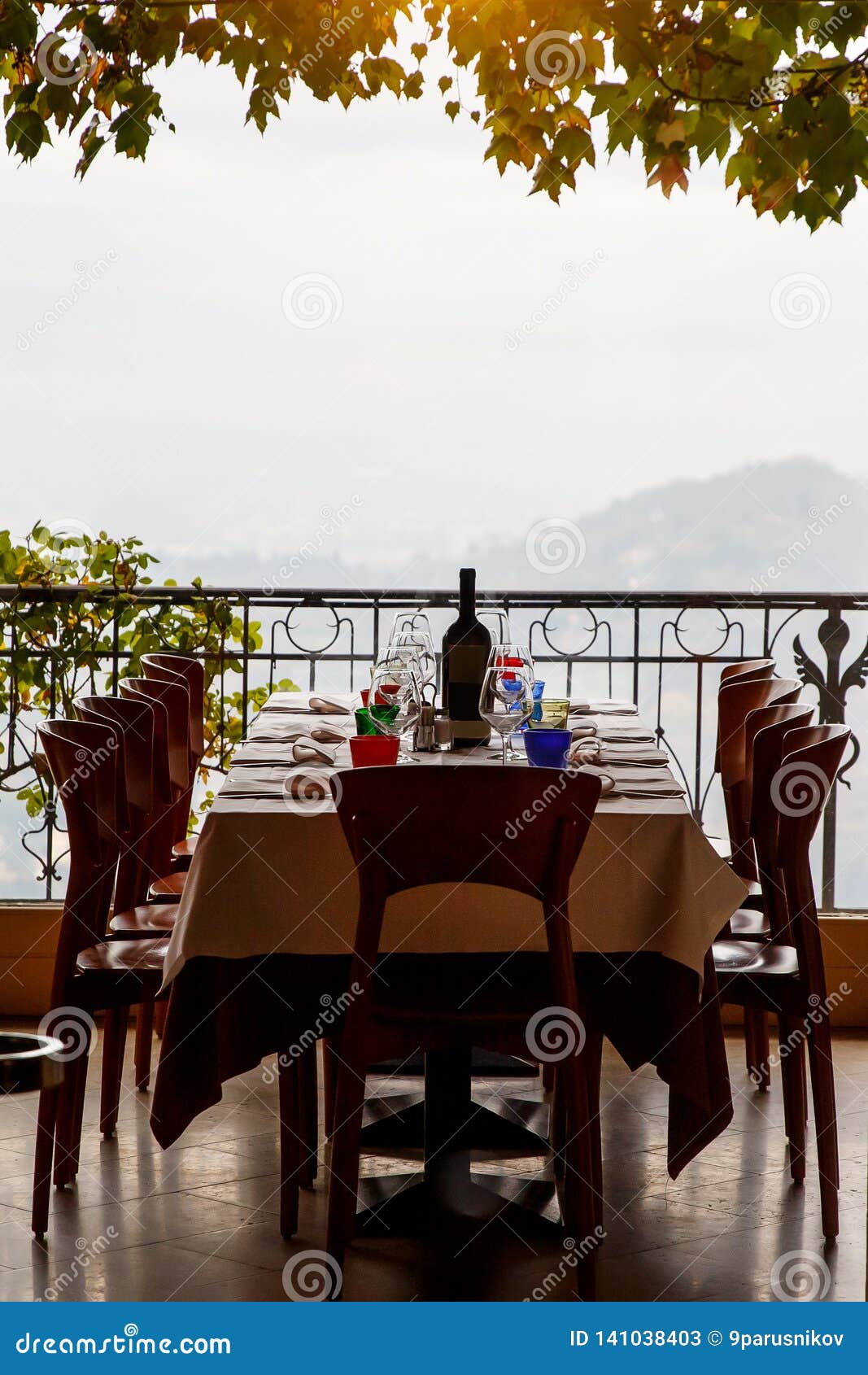 Table in Italian Restaurant Served with a Bottle of Wine and Wine Glasses Stock Image Image of