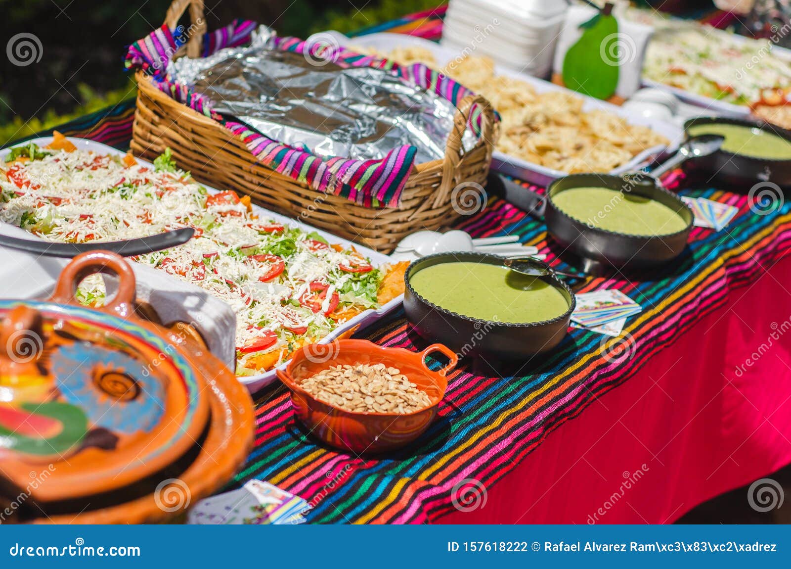 Mexican Food Buffet with a Variety of Plates and Salsas Stock Photo