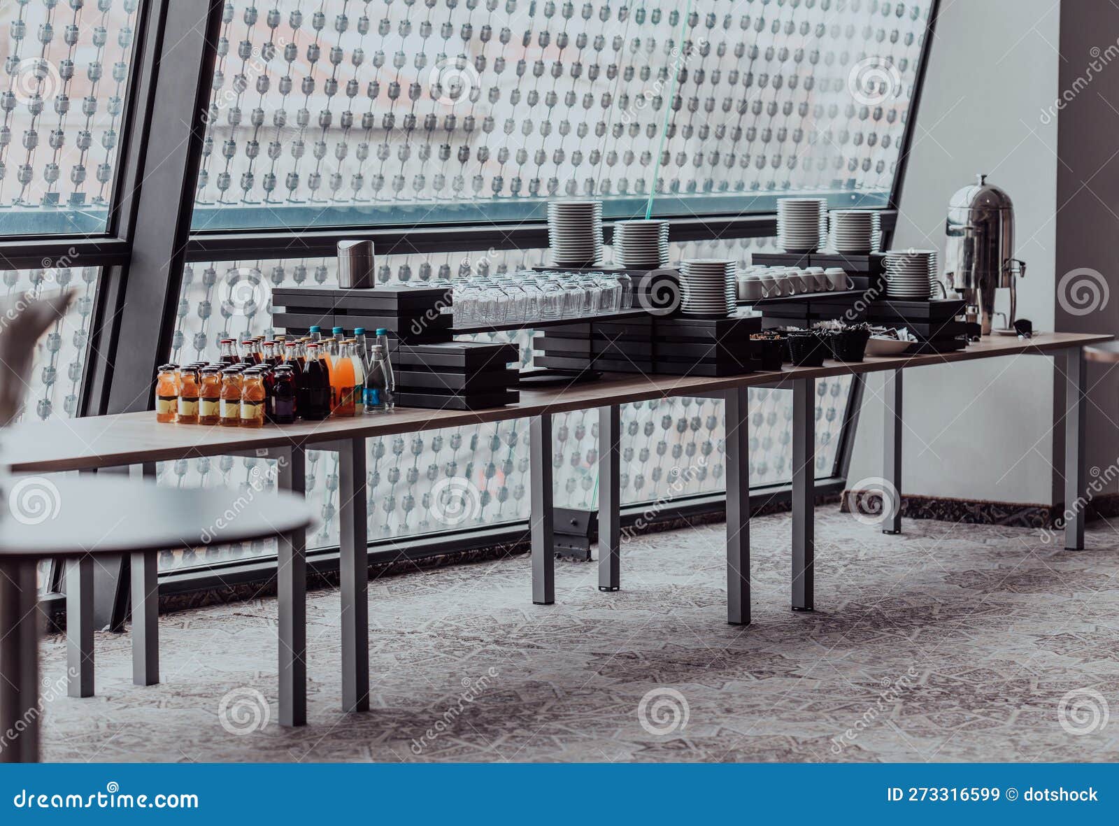 A Table in a Modern Hotel with Dishes Ready To Serve Guests Stock Image