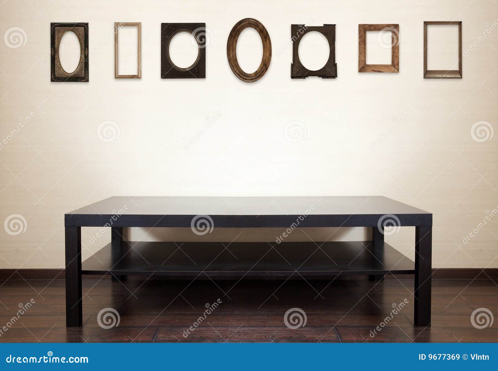 Table and photoframes stock image. Image of interior 9677369