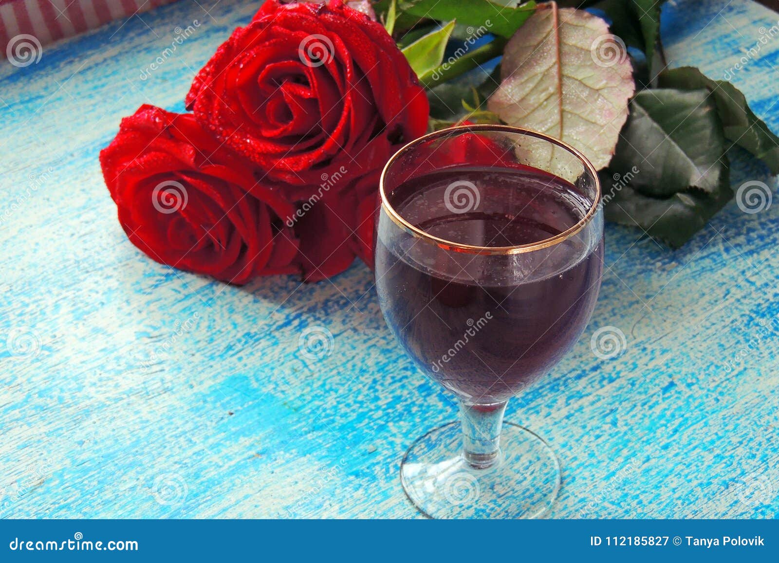 Red wine and roses stock image. Image of gift, dish 112185827