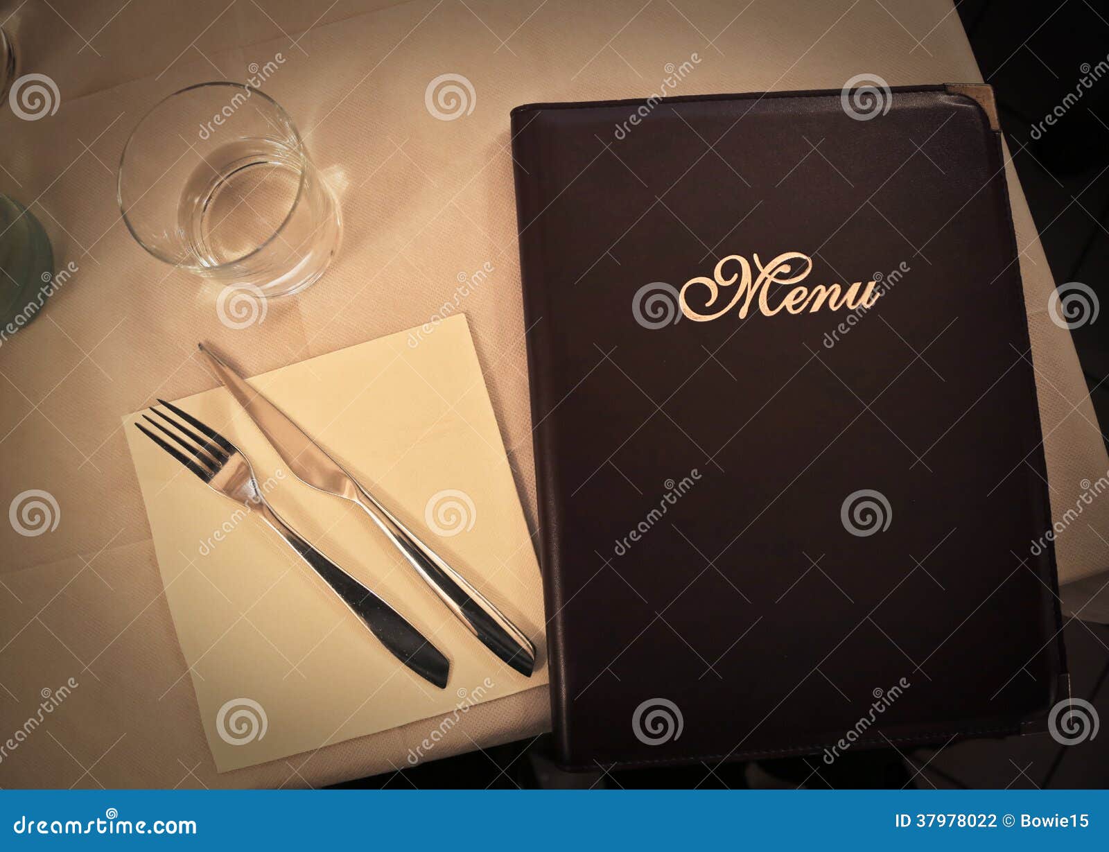 Table in a restaurant stock photo. Image of dinner, menu 37978022