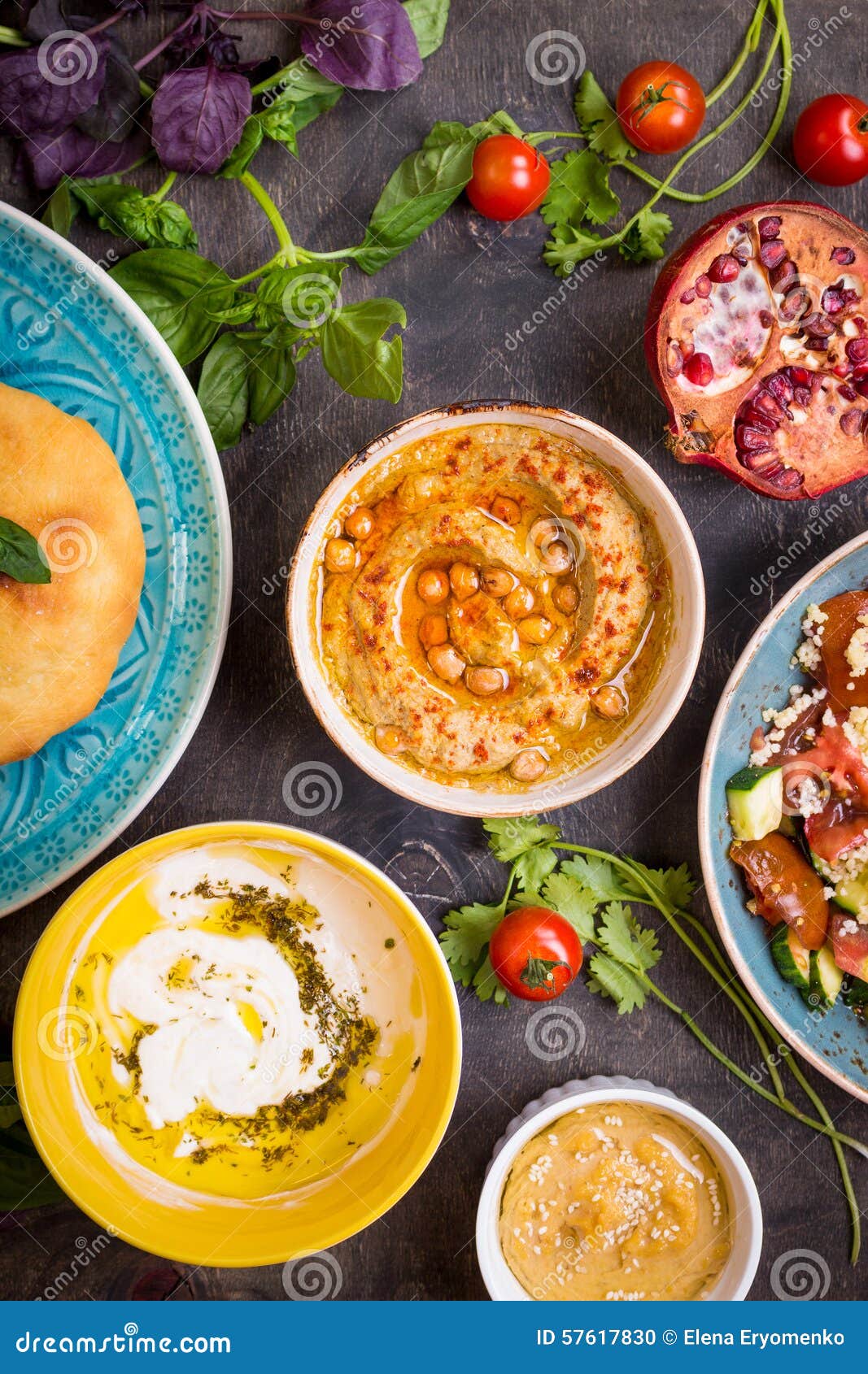 Table Served With Middle Eastern Vegetarian Dishes Hummus Tahi Stock table-served-with-middle-eastern-vegetarian-dishes-hummus-tahi-stock