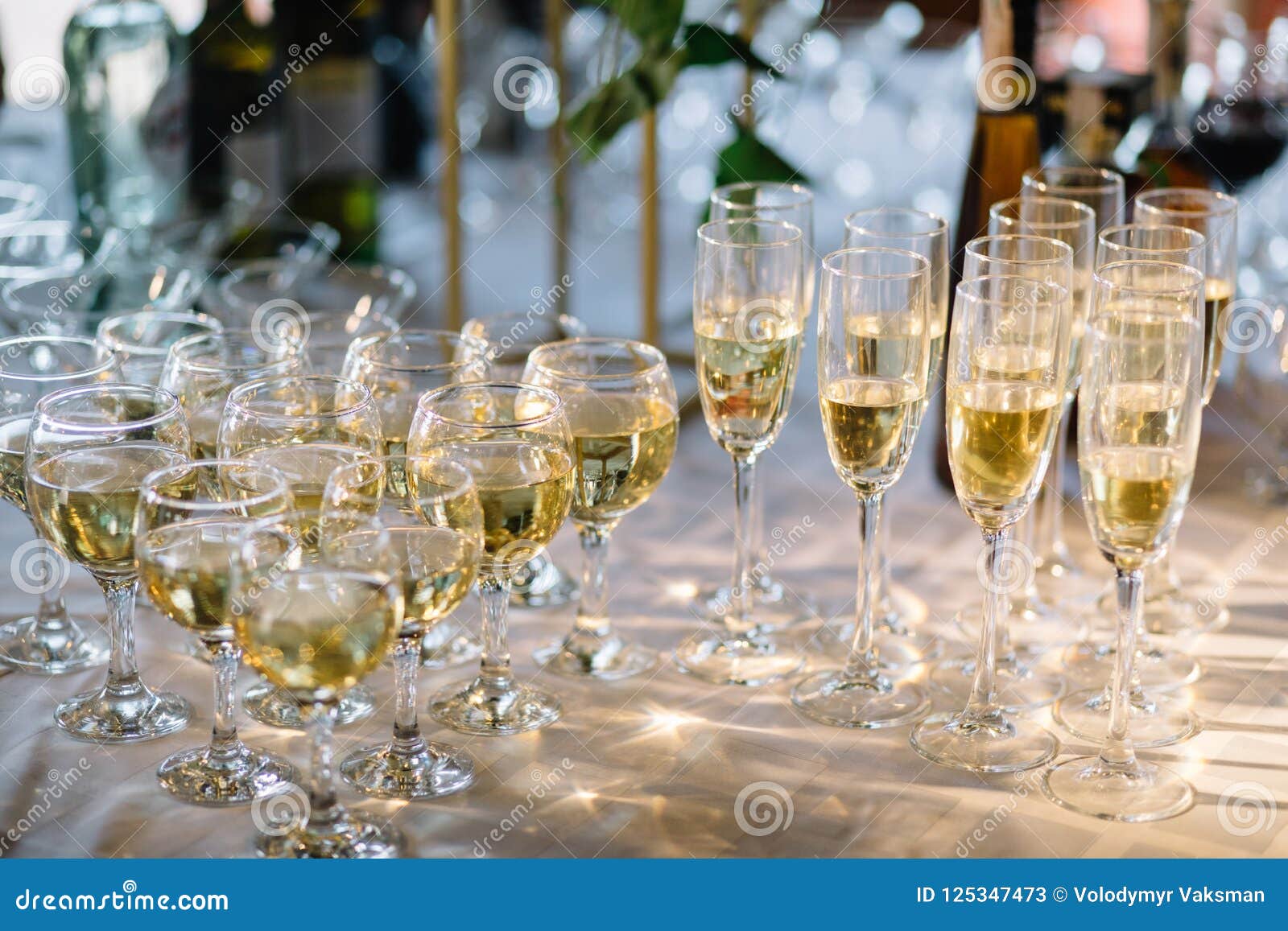 Festive Table Setting with Champagne. Champagne Glasses Close Up Stock