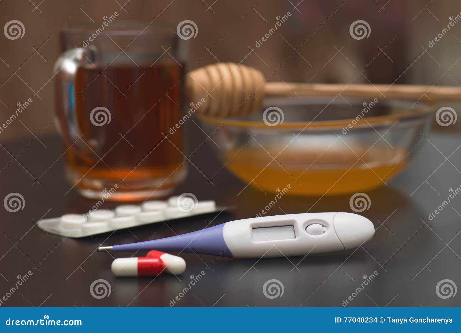 On the Table are Tea, Thermometer, Tablets and Honey Stock Photo Image of table, drink 77040234