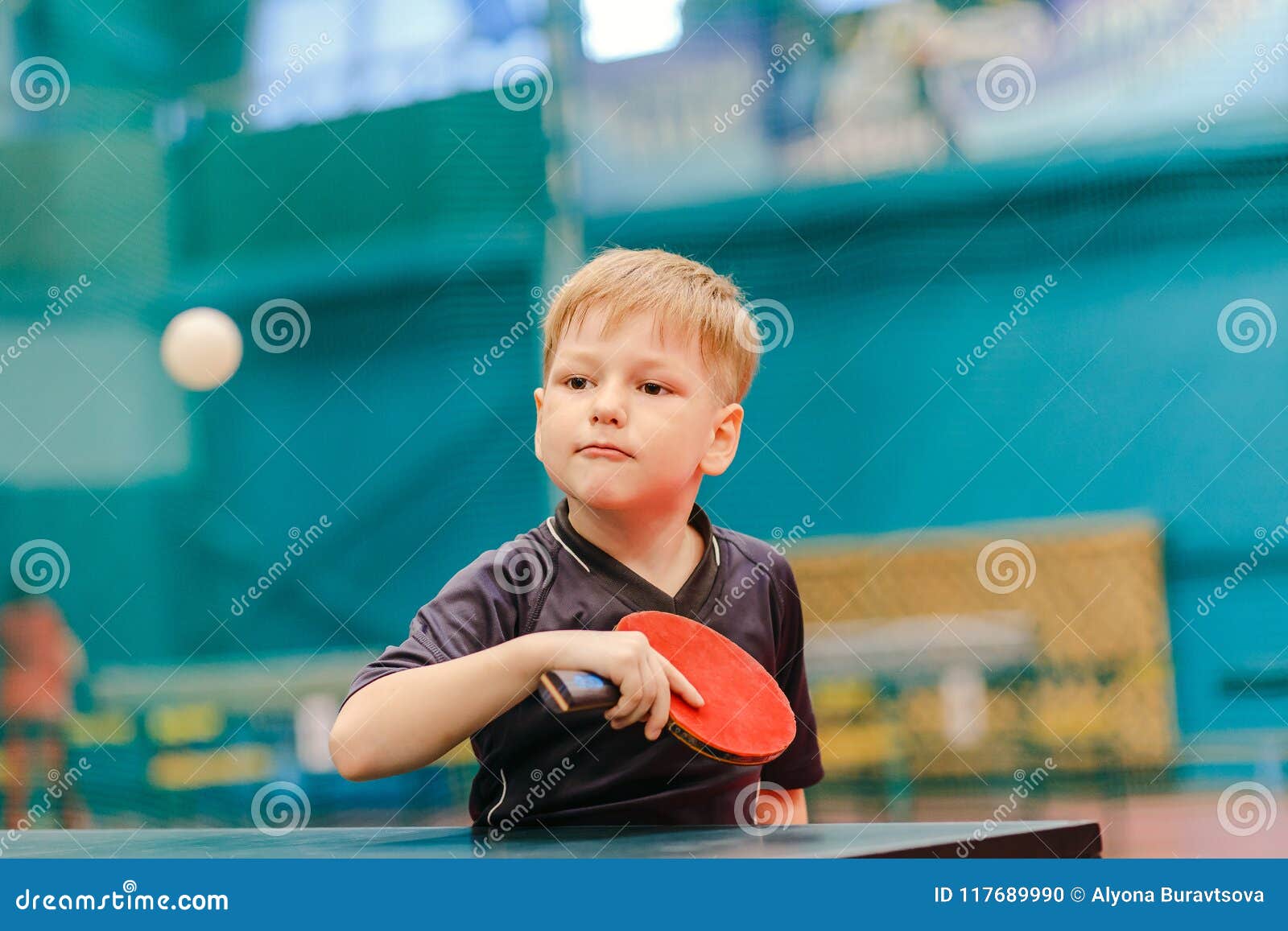 Table Tennis Game, Boy Playing Tennis Ball in the Tennis Hall Stock
