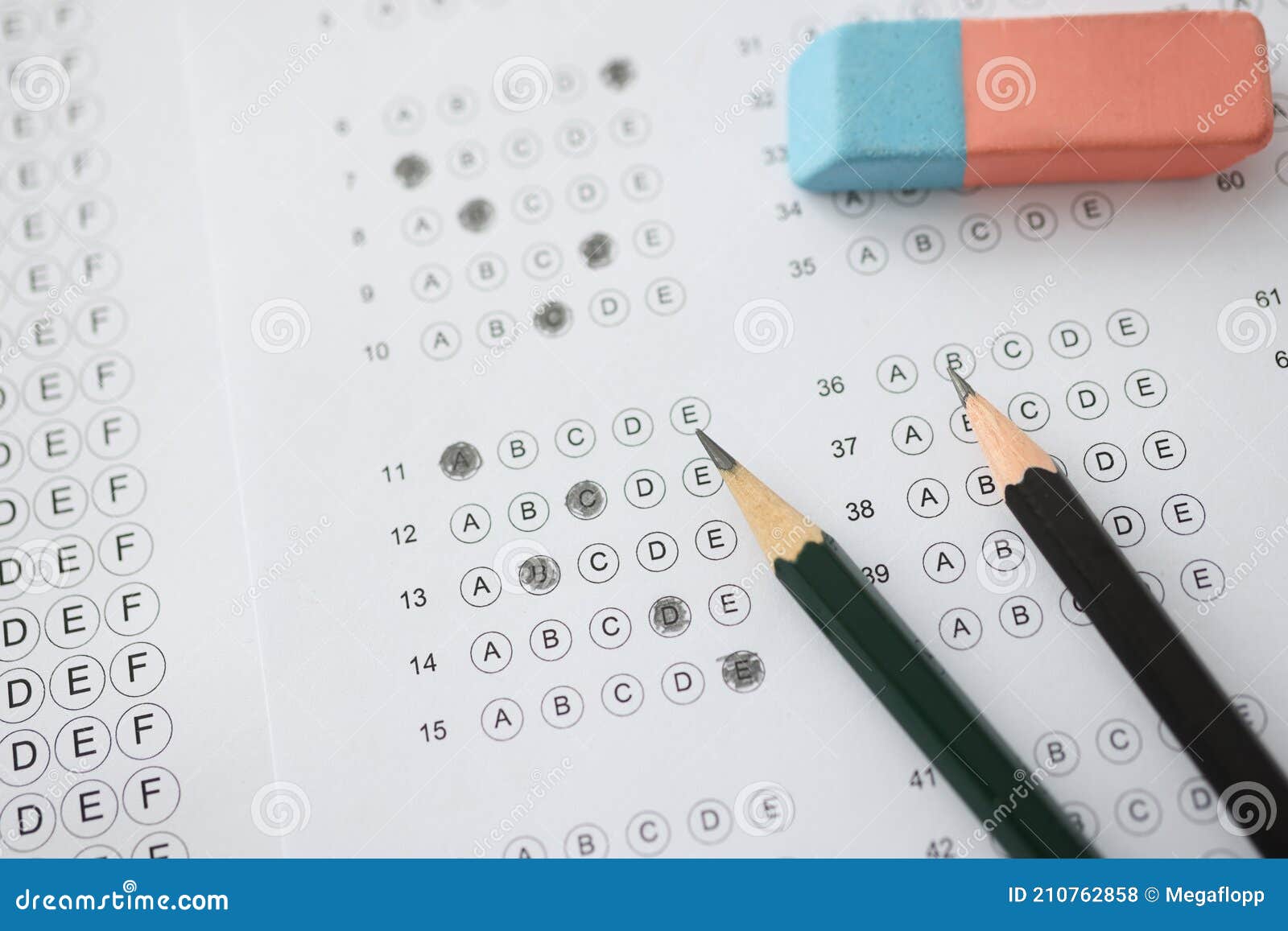 On Table is Test with Options for Answer Pencils and Wash Stock Photo