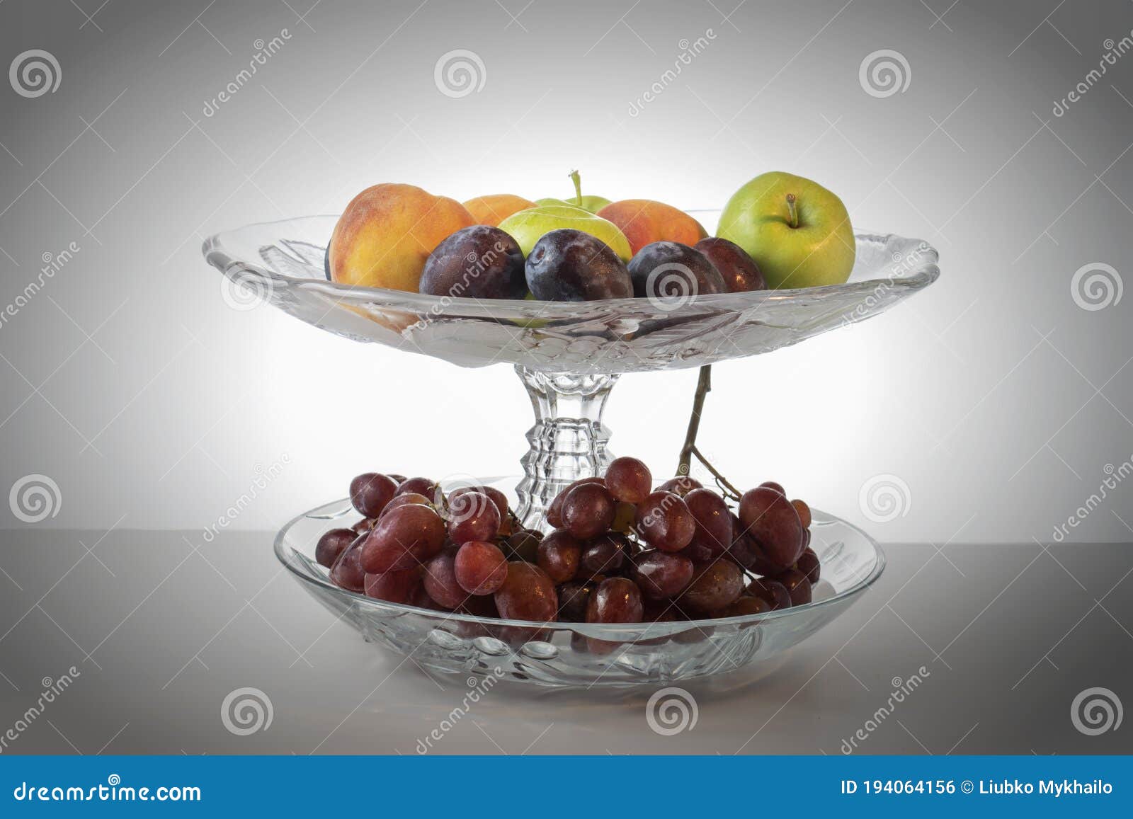 Vase For Fruit From Glass Of Blue Color Isolated On A White Background